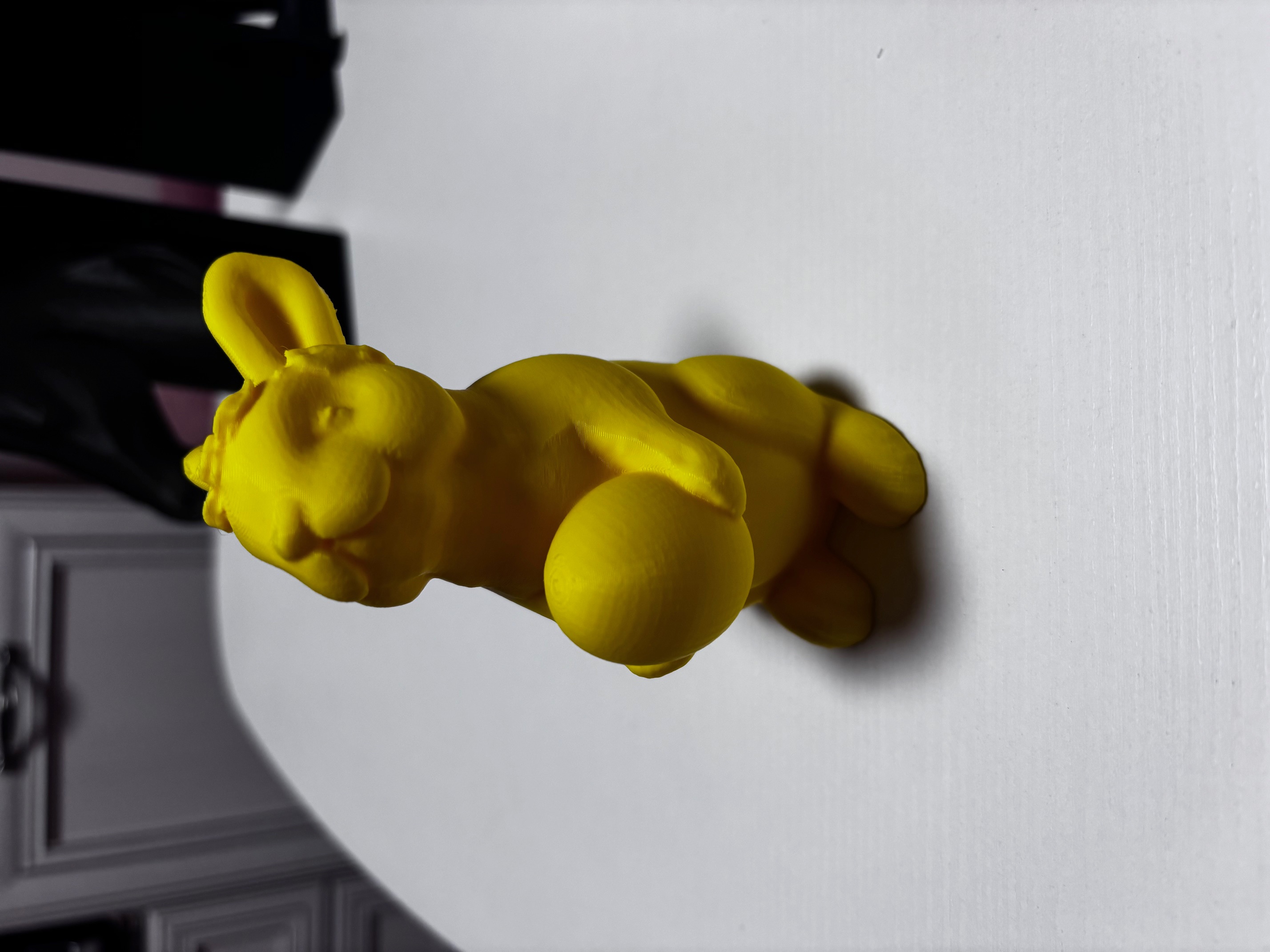 Easter bunny holding an egg