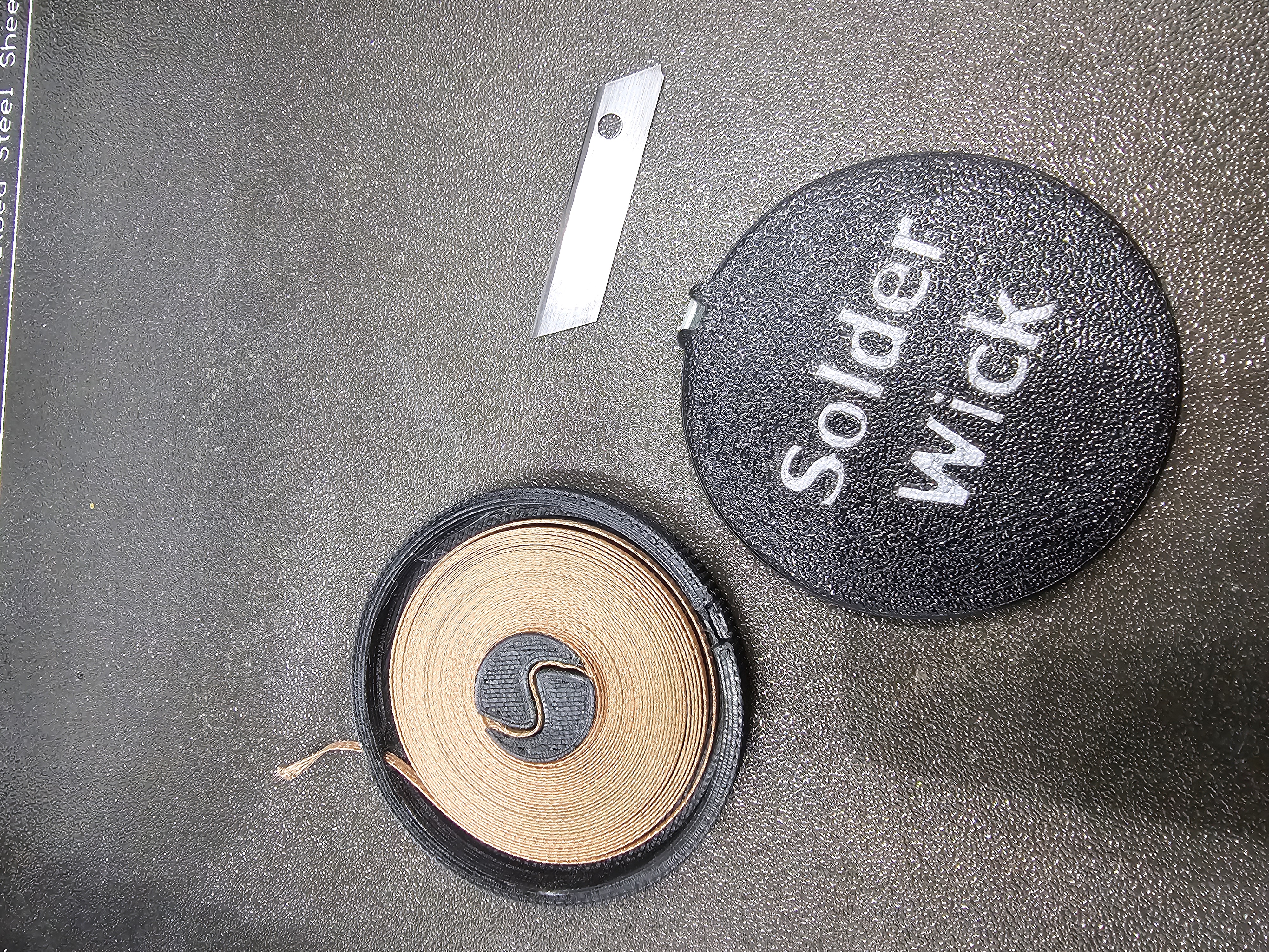 WickWinder: Solder Wick Dispenser with Integrated Cutter