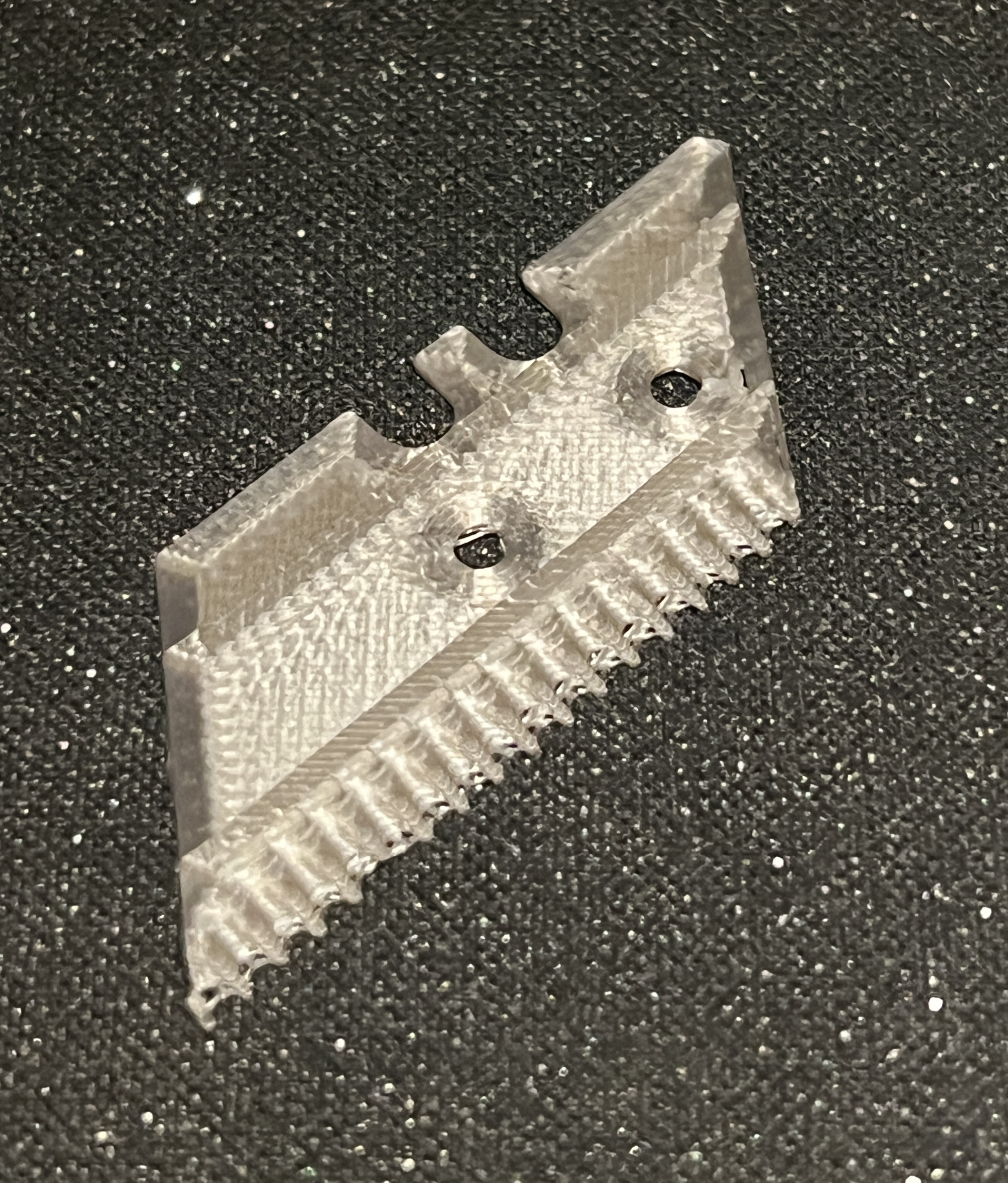 Serrated blade for Guillotape Dispenser