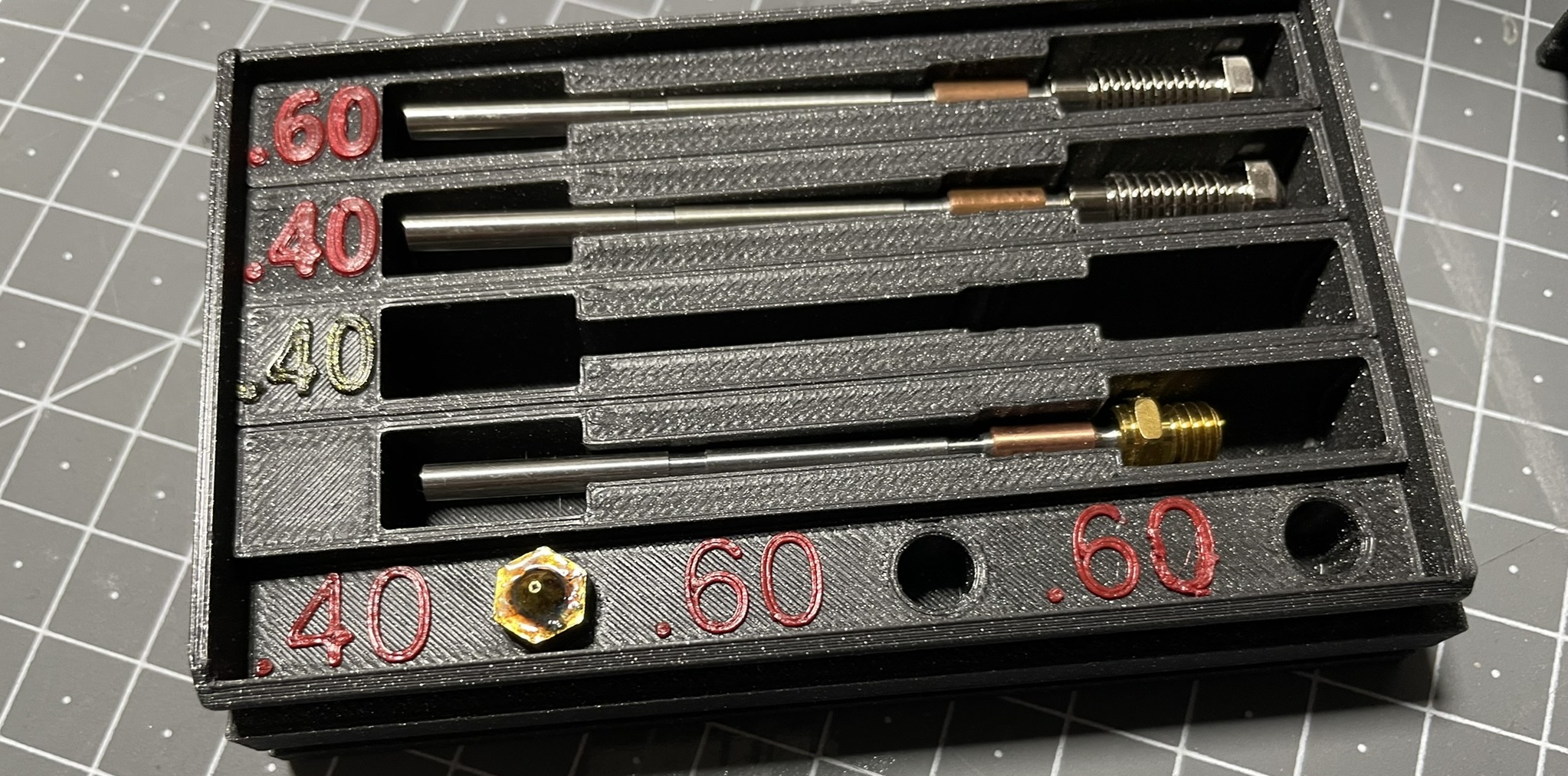 Slot for 3 v6 style nozzles for "Yet another Nextruder Nozzle Box"