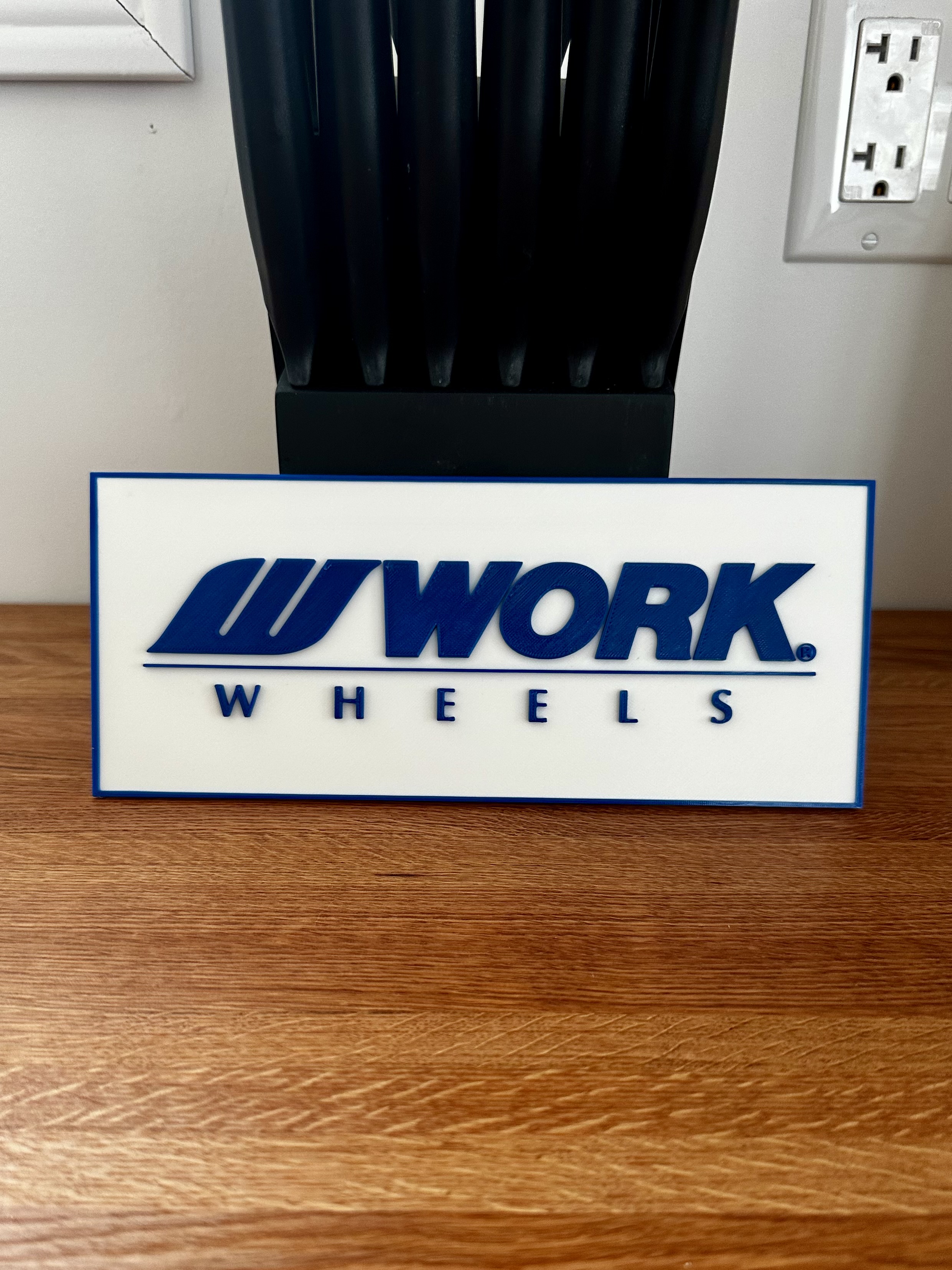 Work wheels sign