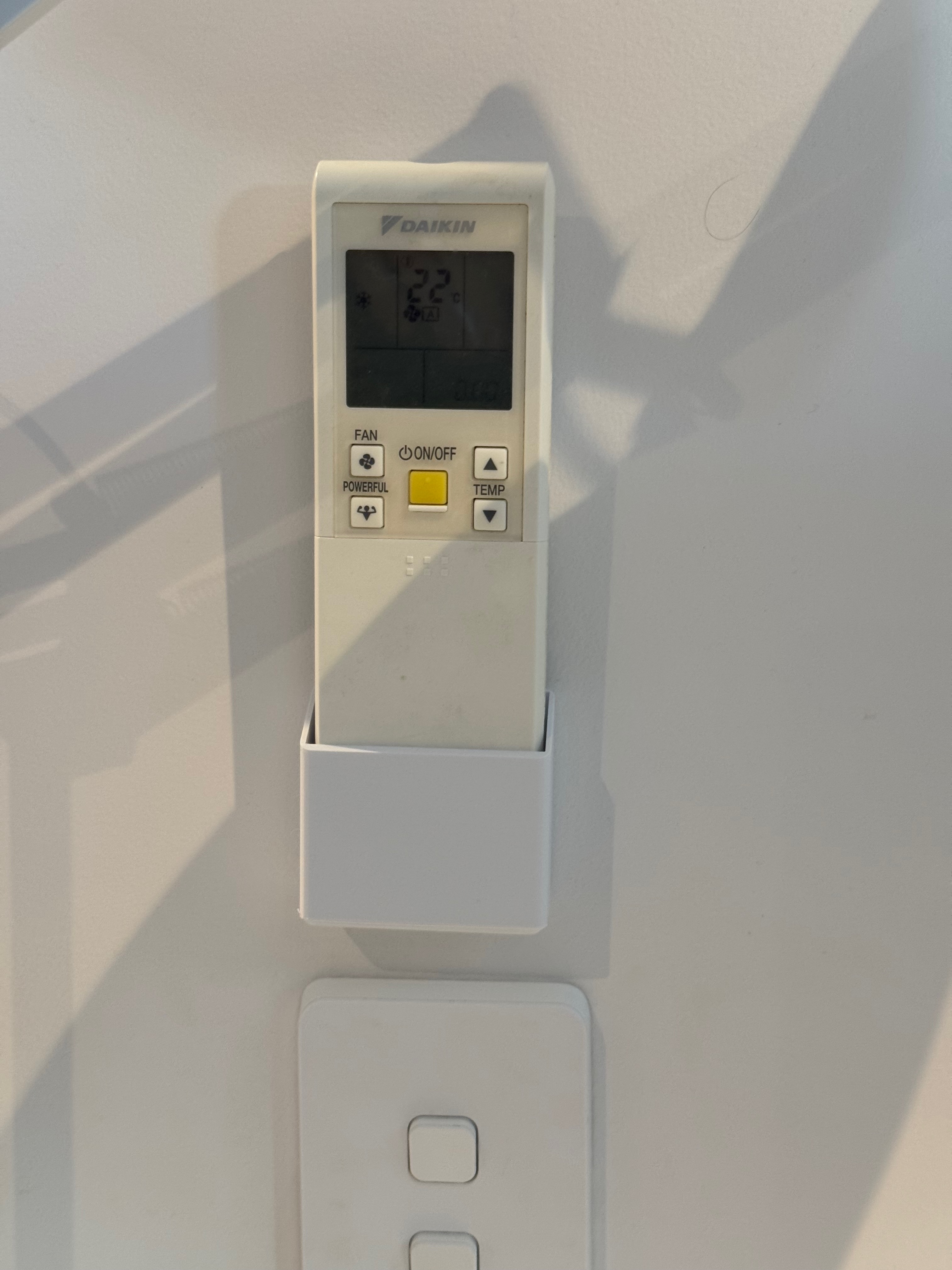 Air conditioner heat pump remote control wall mount holder