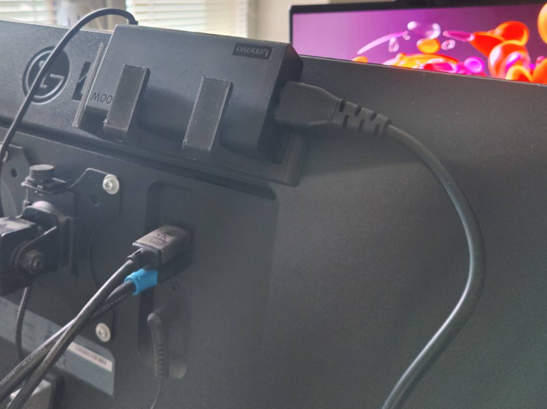 Holder for notebook wall adapter
