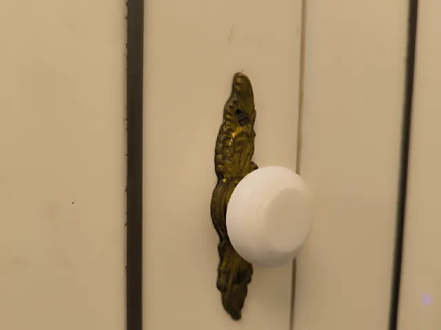 Furniture door stopper