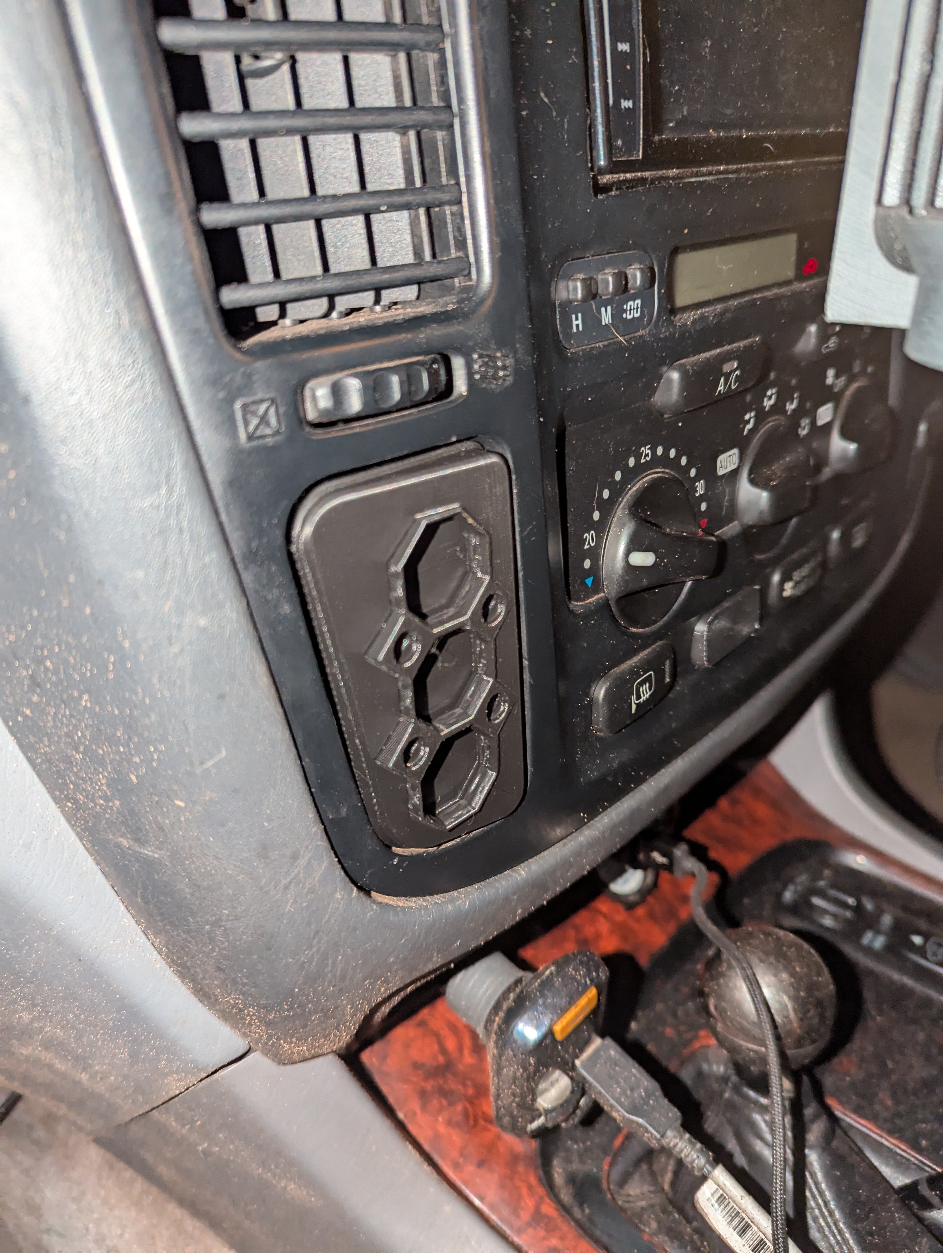 Landcruiser 100 Multiboard Mount to fit side of heater controls