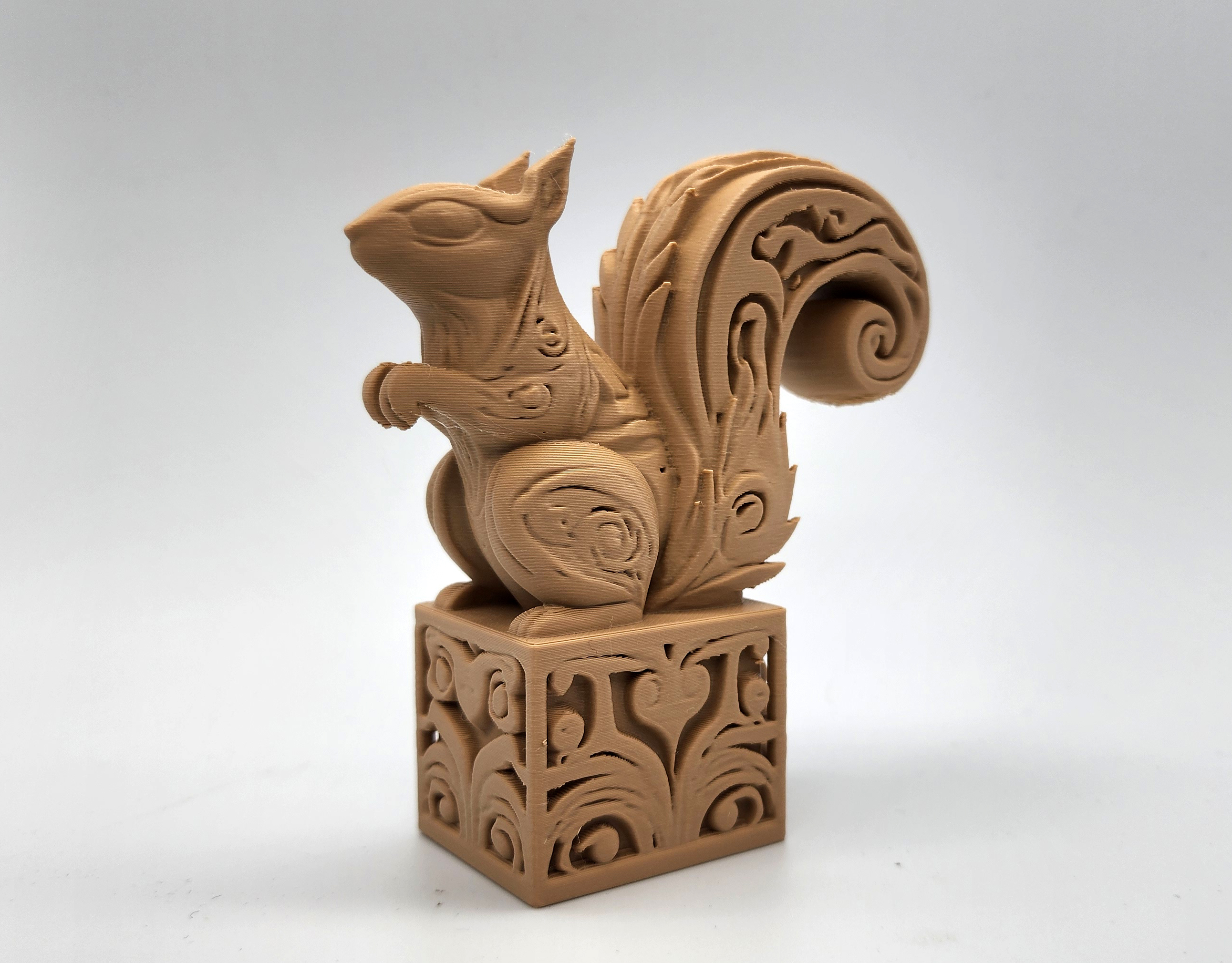 Wood-Carved Squirrel on a Box