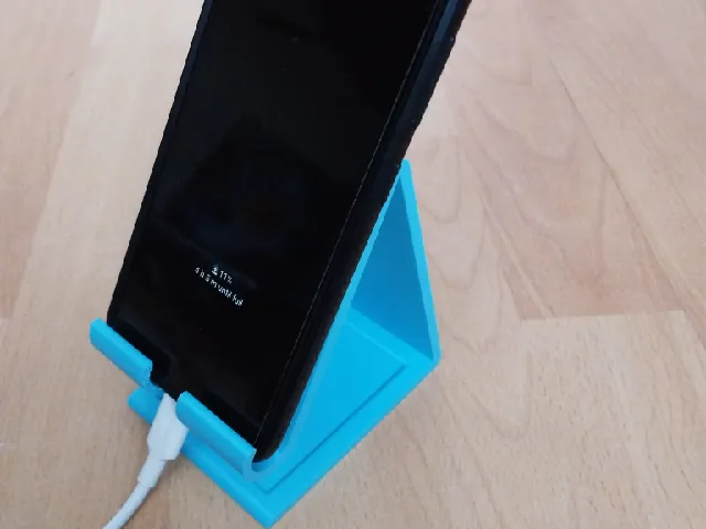 phone holder with charging cable hole
