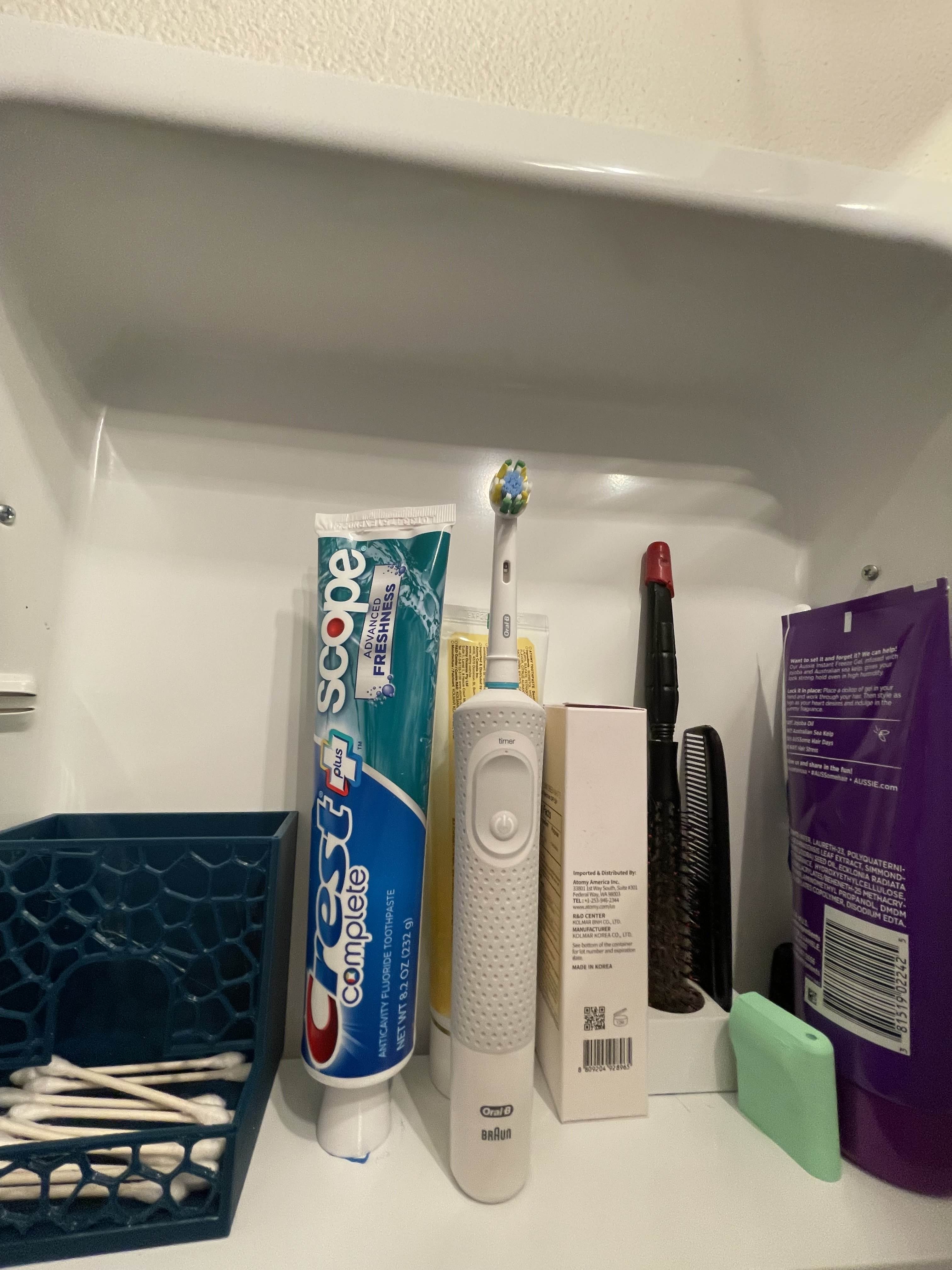 Vertical Toothpaste Tube and Comb Holders