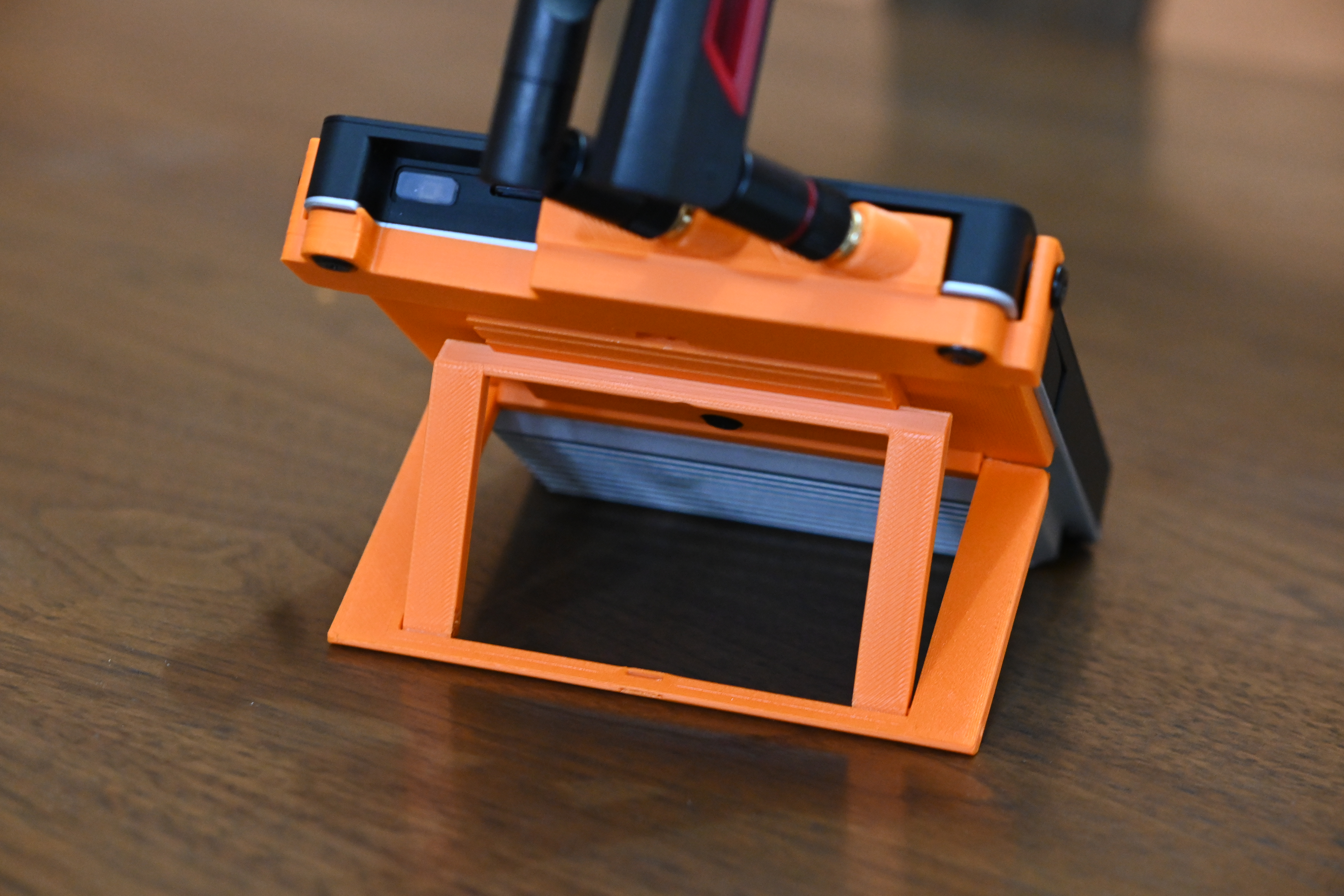 Backplate with folding stand and antenna mounts for ClockworkPi uConsole