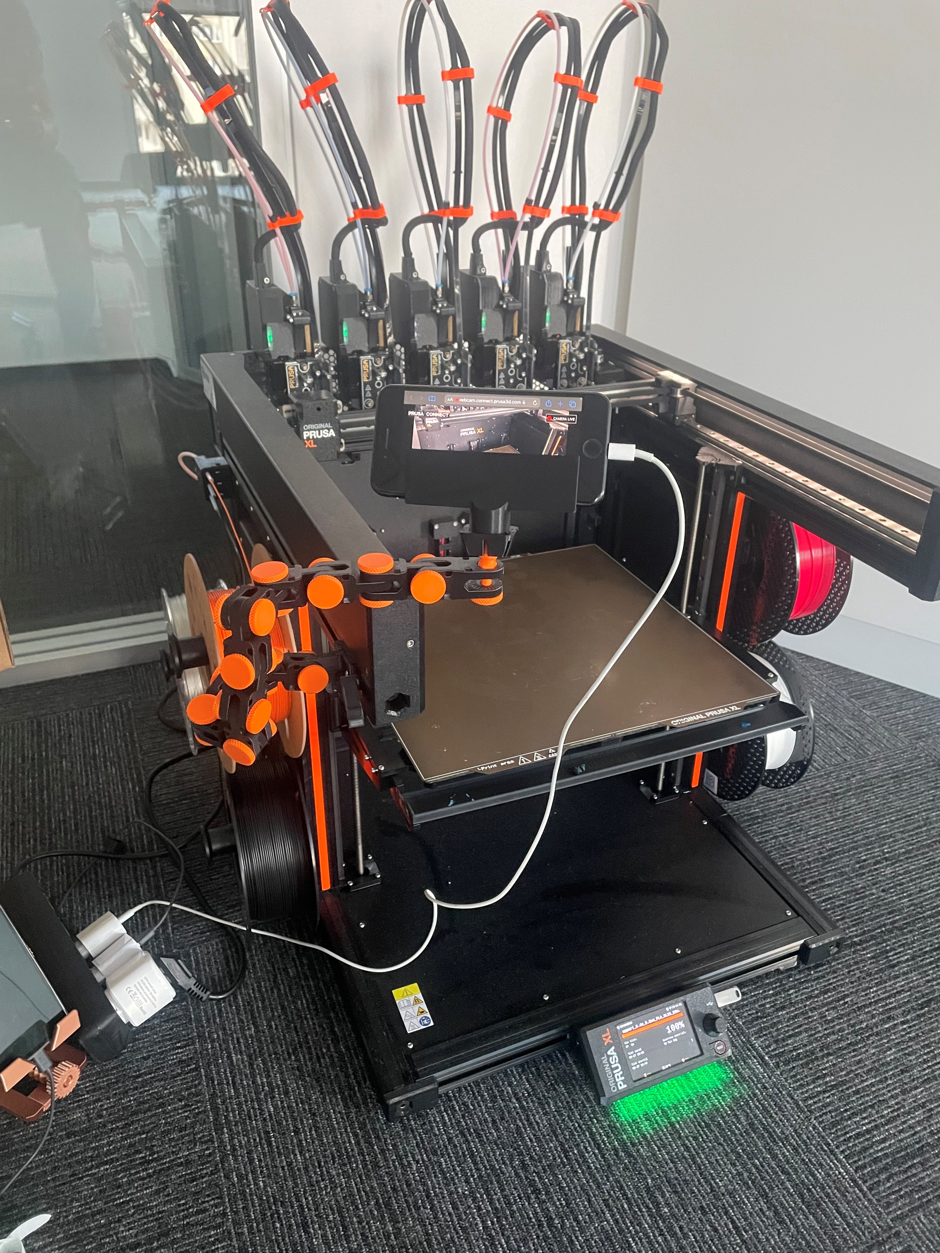 Articulating phone holder