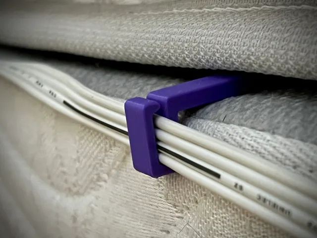 Electric blanket cable holder