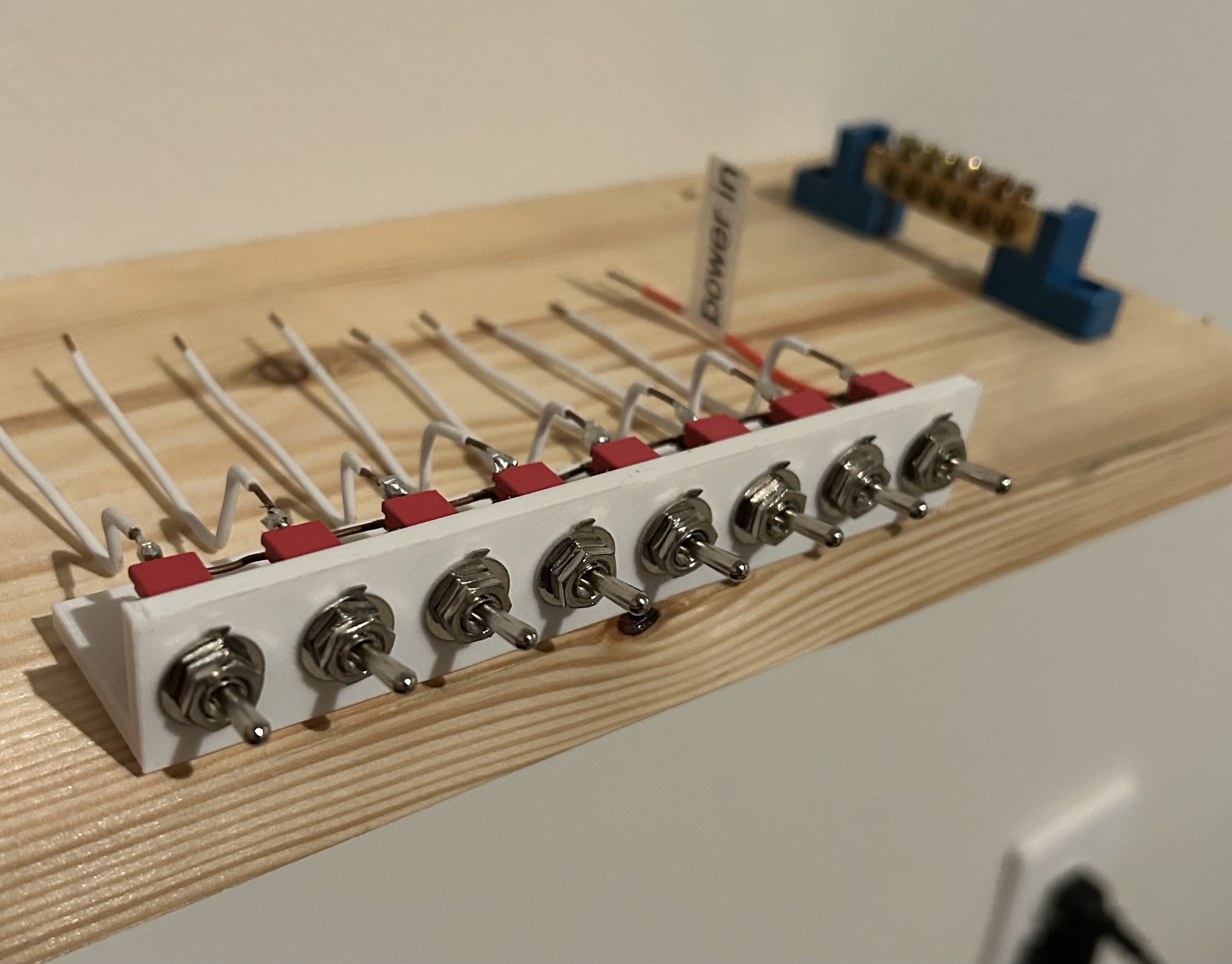 Switch board for toggle switches