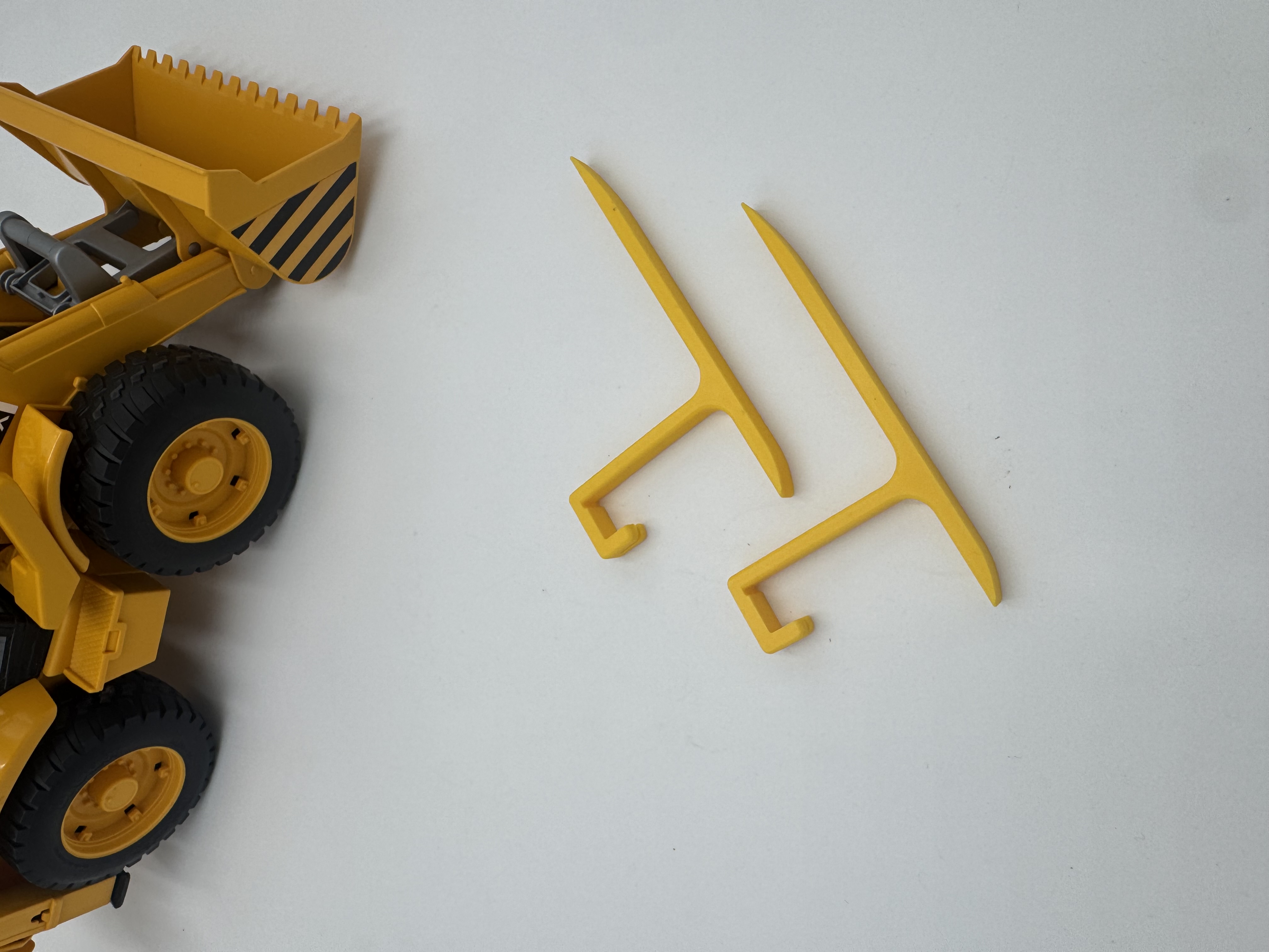 Paletové vidle na traktorbagr JCB 4CX Bruder 2428