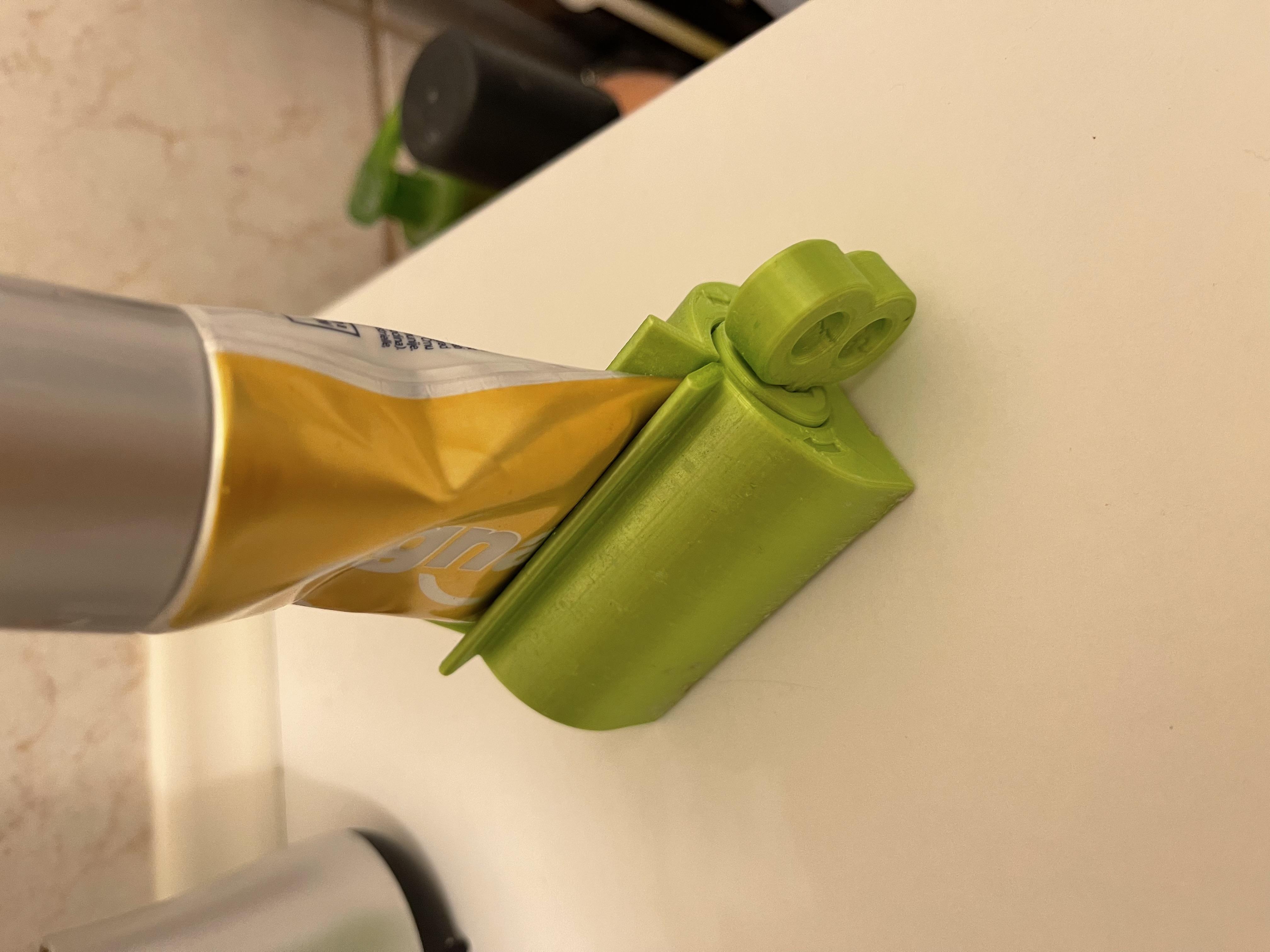 Lis na zubní pastu/toothpaste press