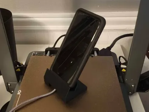 Vertical (and horizontal) phone stand (charger compatible)