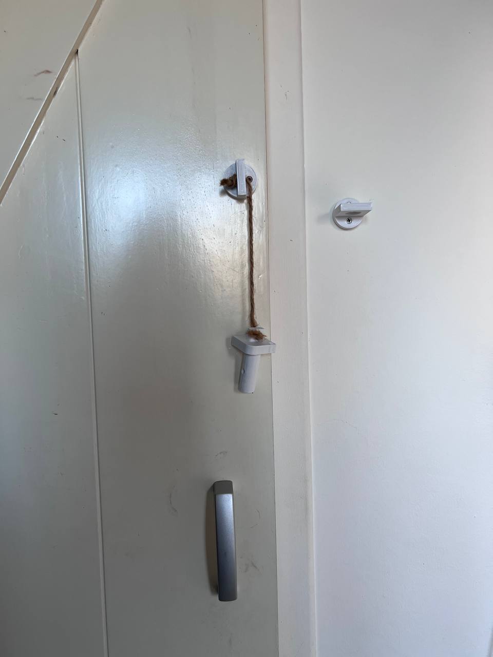 Sliding door hook