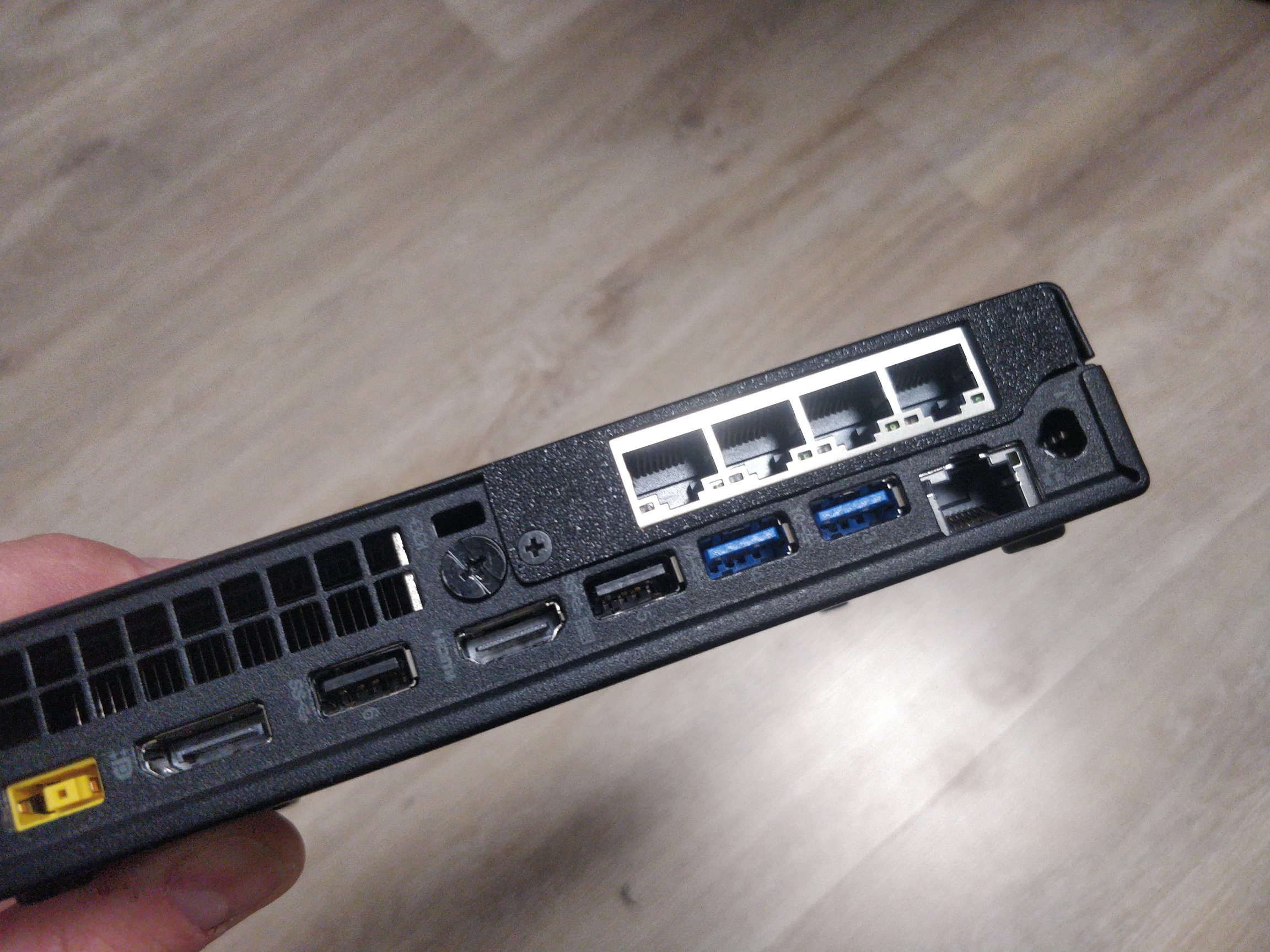 Low profile bracket/baffle for BCM5719-4P nic in a Lenovo ThinkCentre M920q