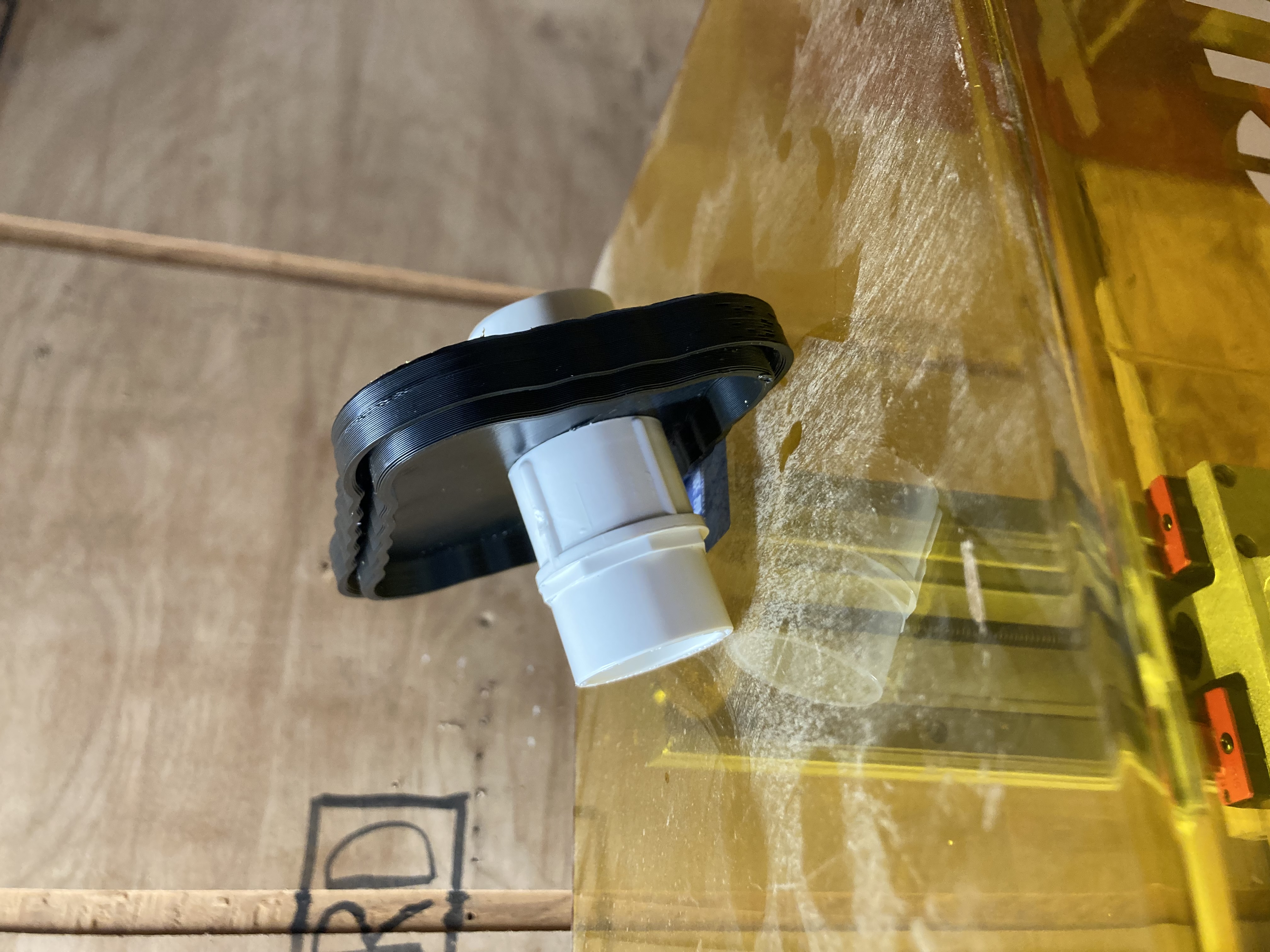 Downspout end cap with hole