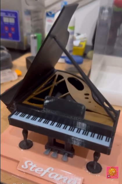 Remixed Grand Piano Phone Holder with a customizable base, including a name plate