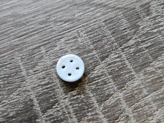 Shirt button