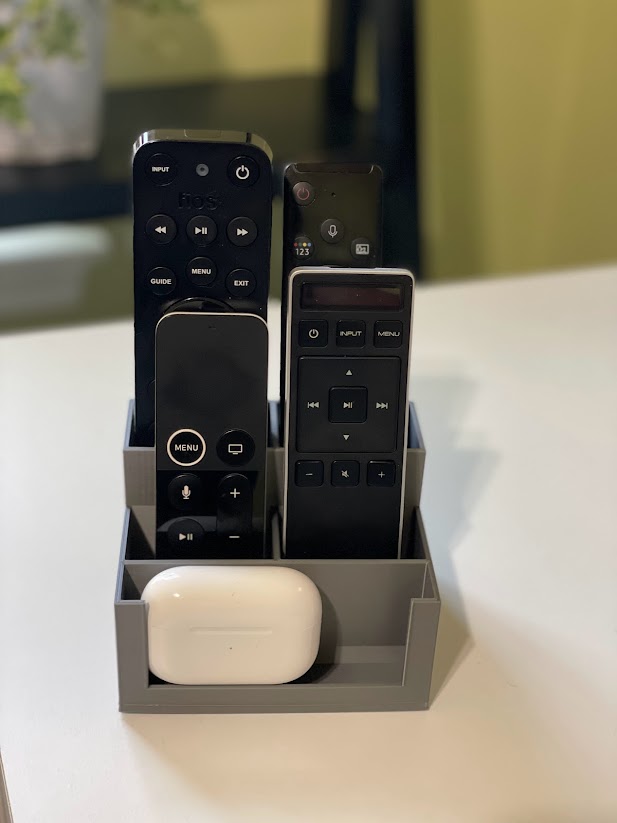 Simple remote control caddy with phone stand. Two sizes.