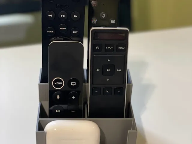 Simple remote control caddy with phone stand. Two sizes.
