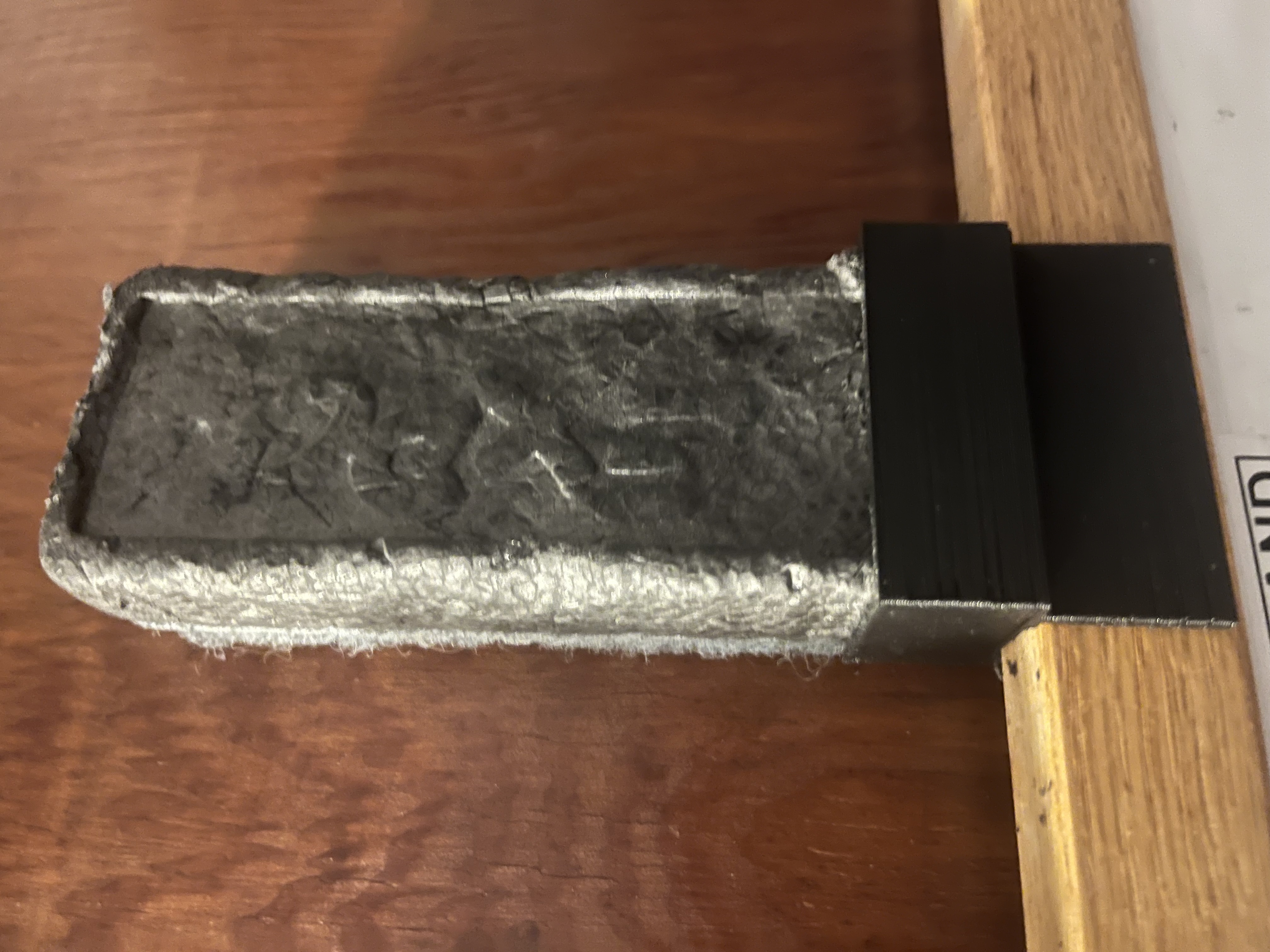 Eraser holder for top of 20mm frame