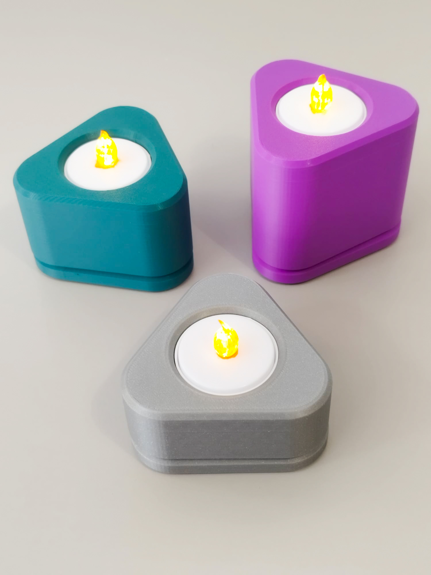 Minimalist triangular candle holder.