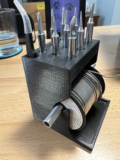 Solder dispenser and tip holder