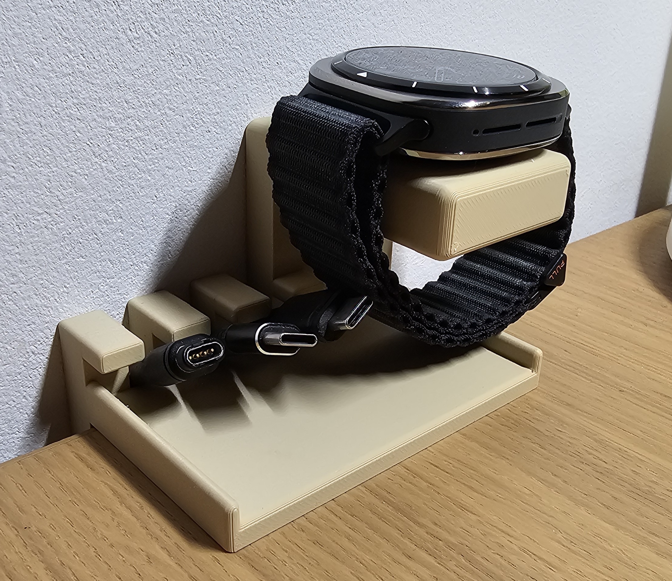 Desk cable organizer, wireless charger.