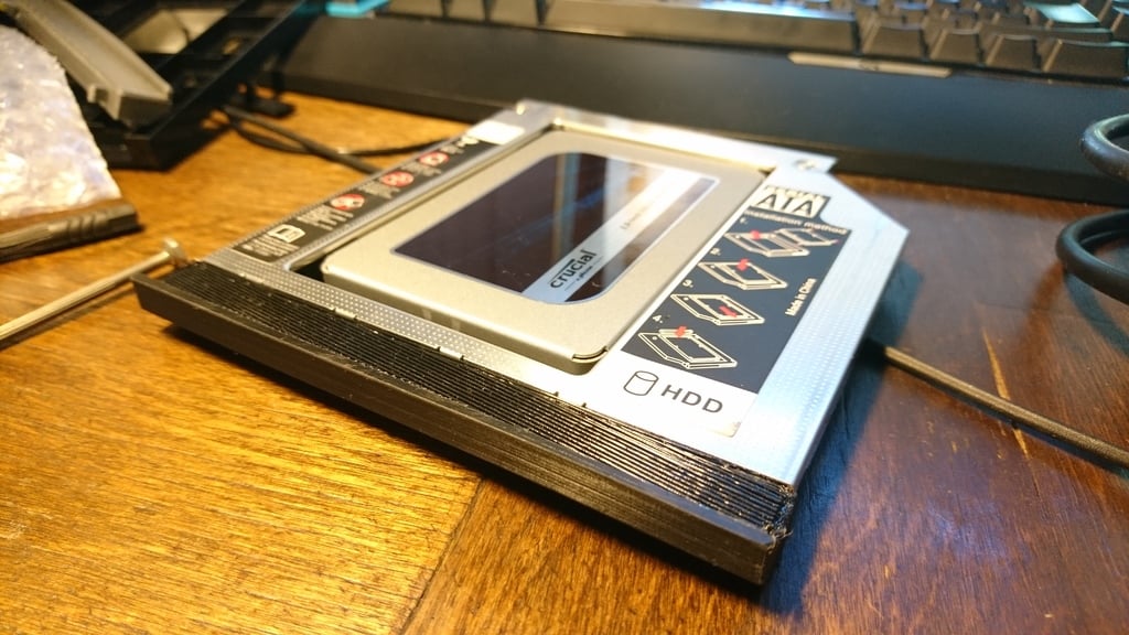 Laptop optical drive bay SSD tray cover