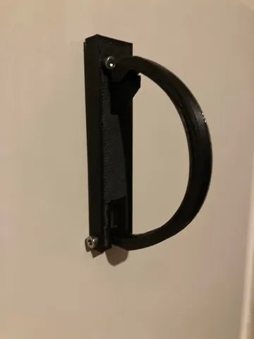 Wall cable holder