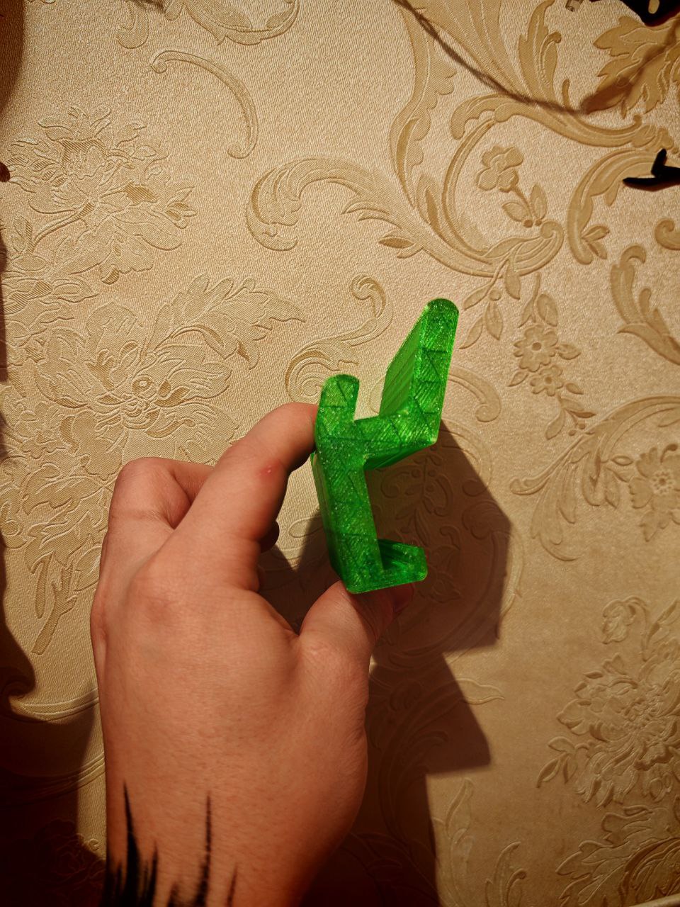 A phone stand that attaches to the table "KLIPPSK" IKEA