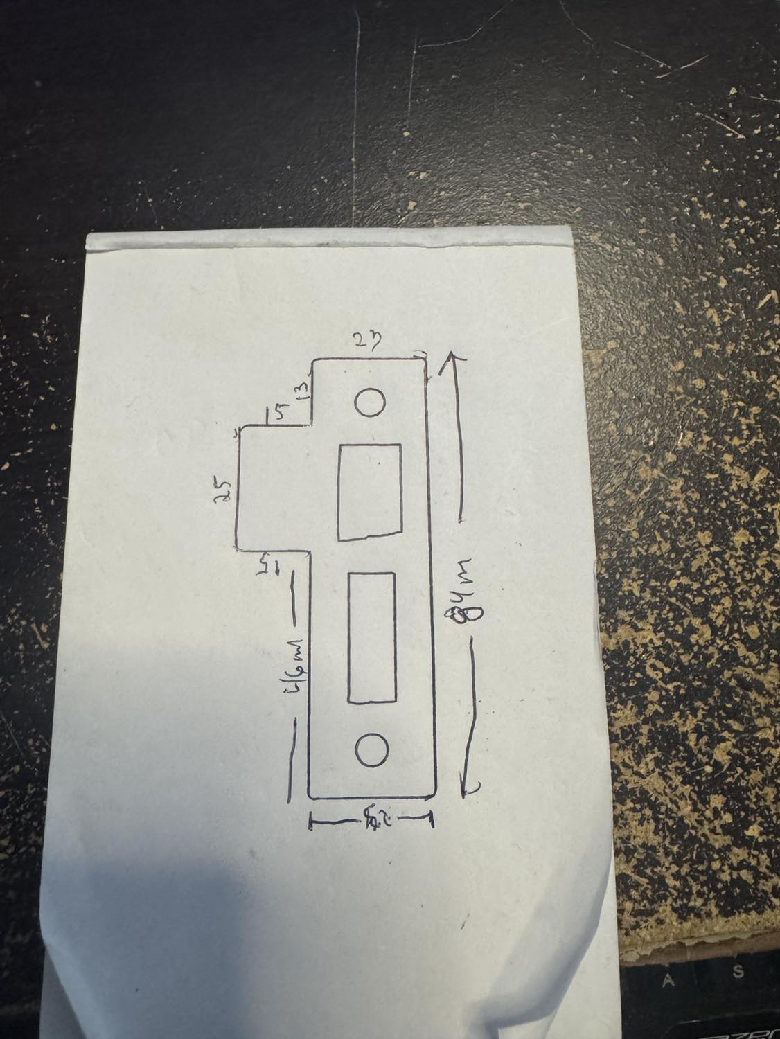 Strike plate spacer