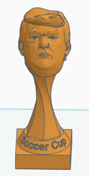 trump cup- a soccer trophy with trump's head