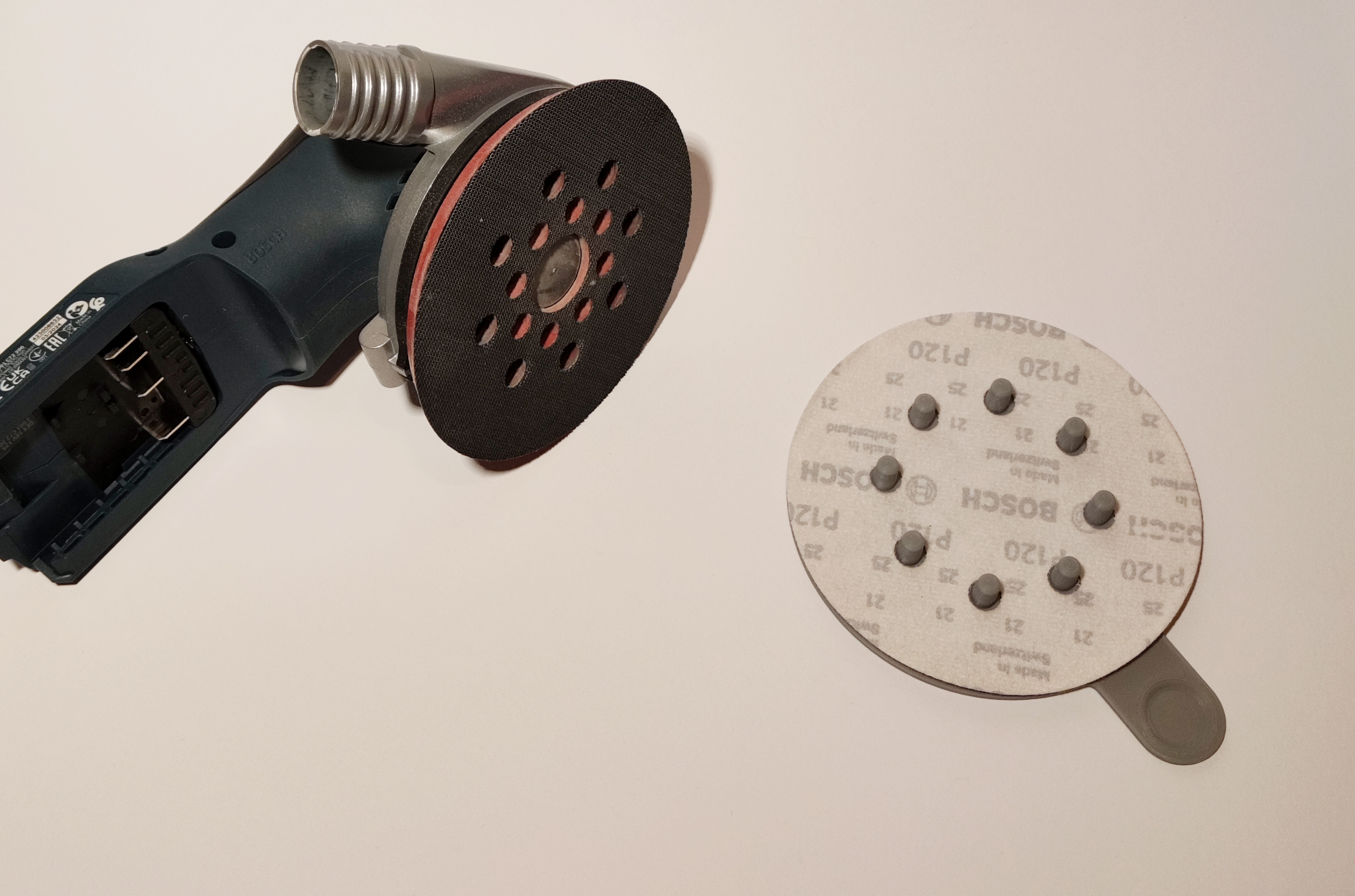 125mm orbital sander, sandpaper alignment, positioning helper