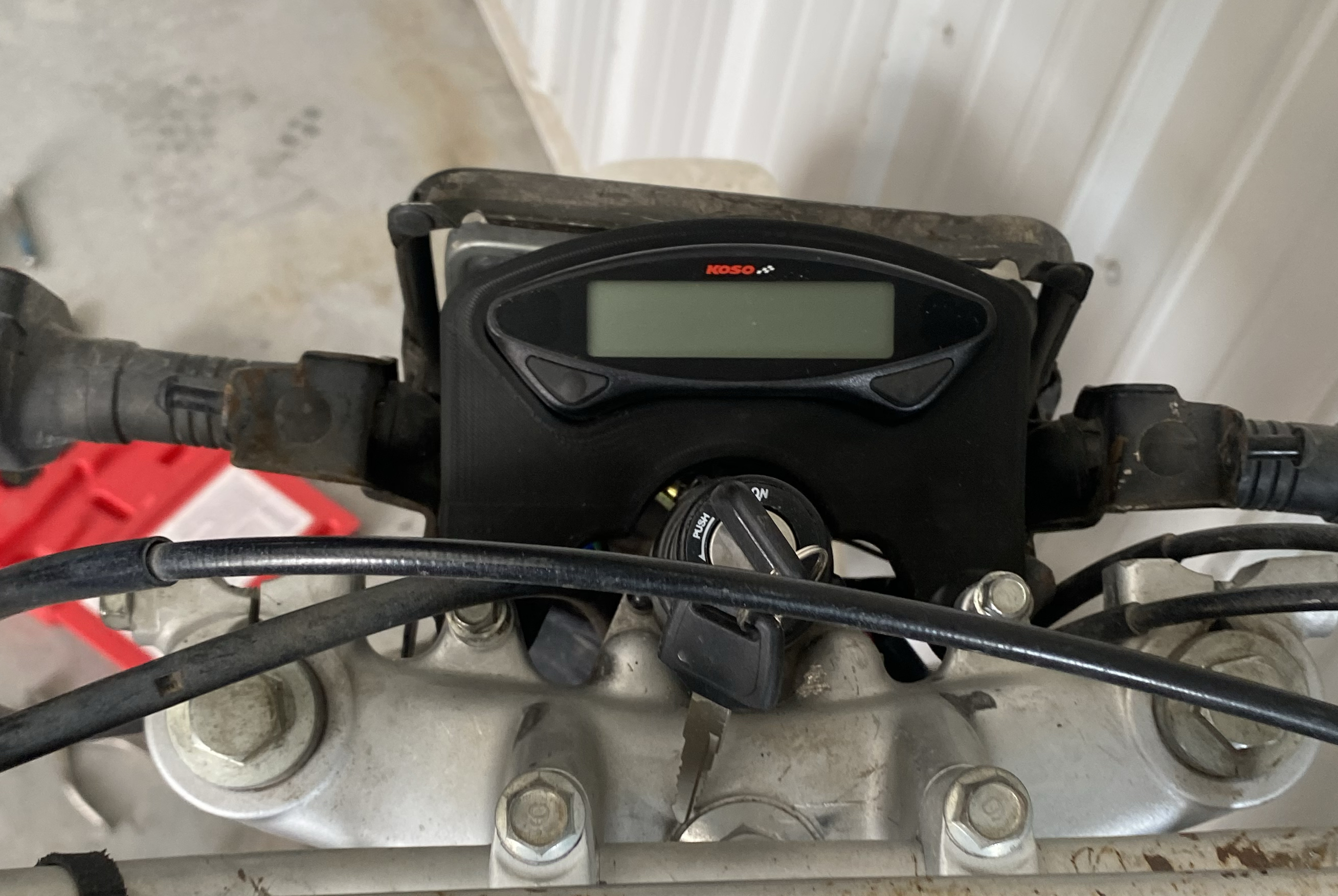 Koso EX-02 universal speedometer mount for a Yamaha TW200 Trailway