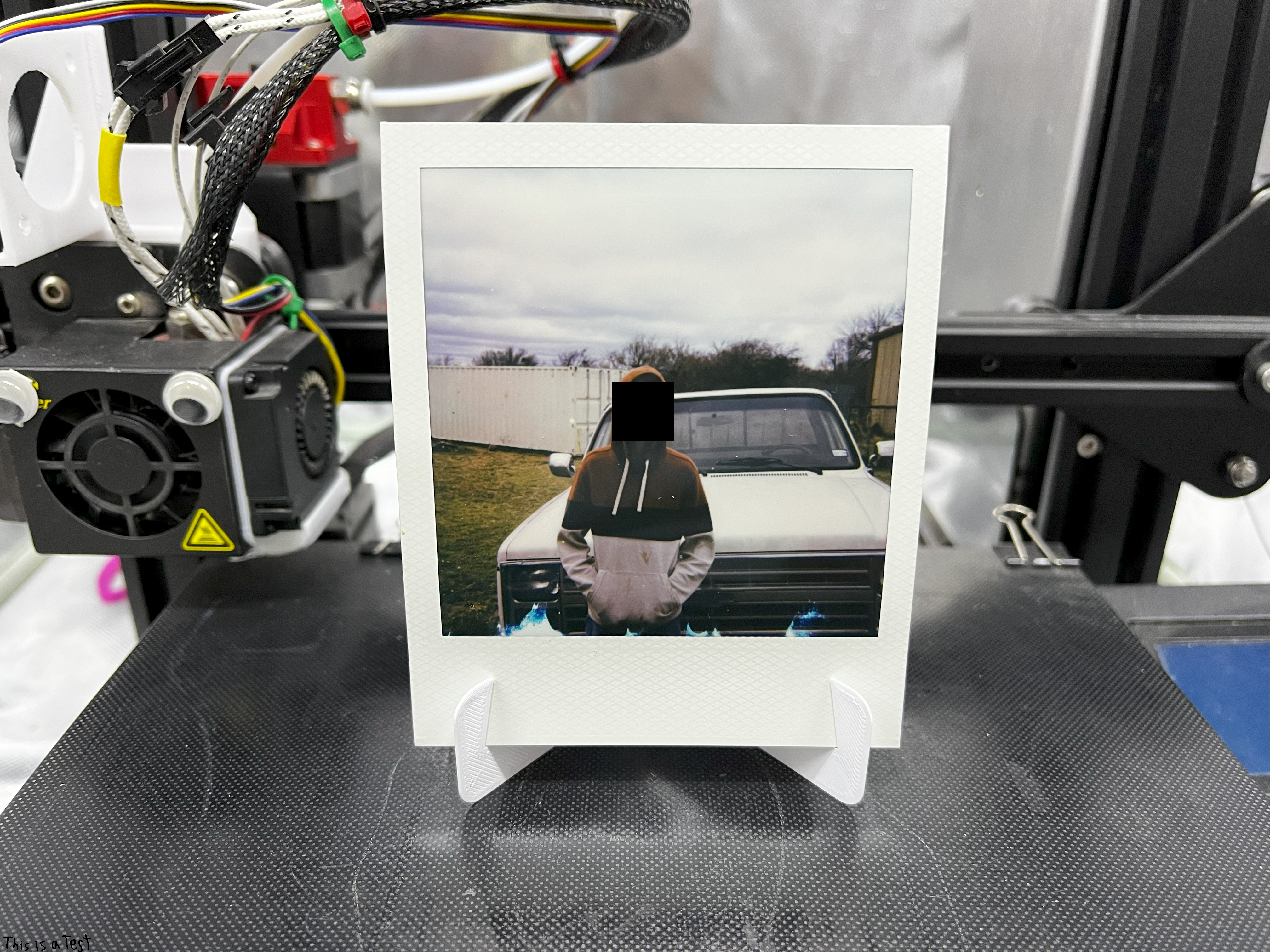 polaroid film stand