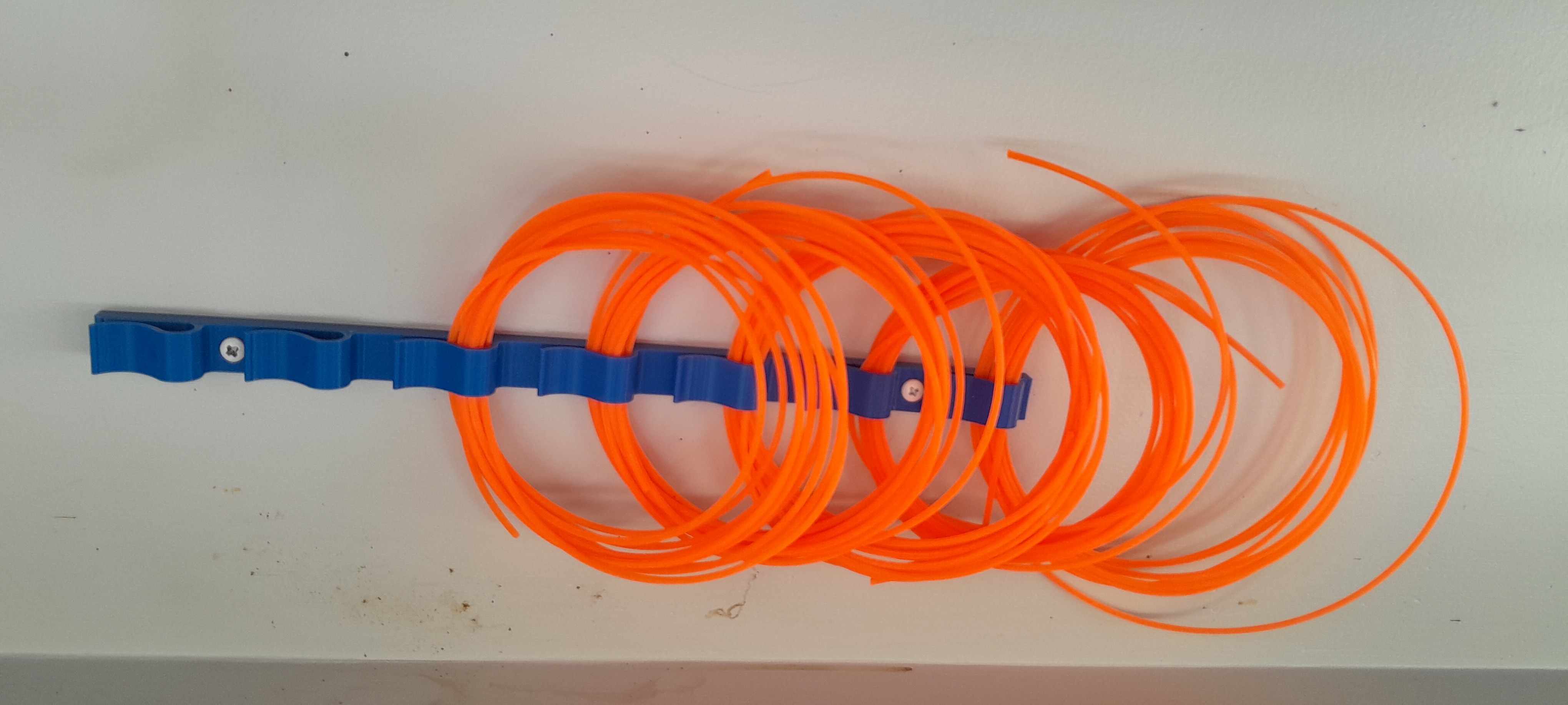 Trimmer string holder