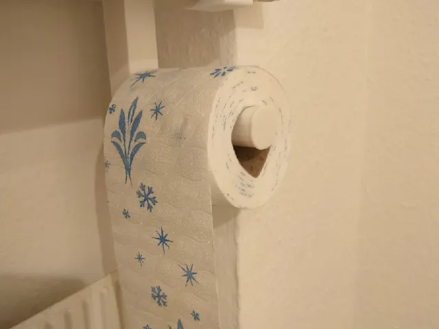 a toilet paper holder for the windowsill