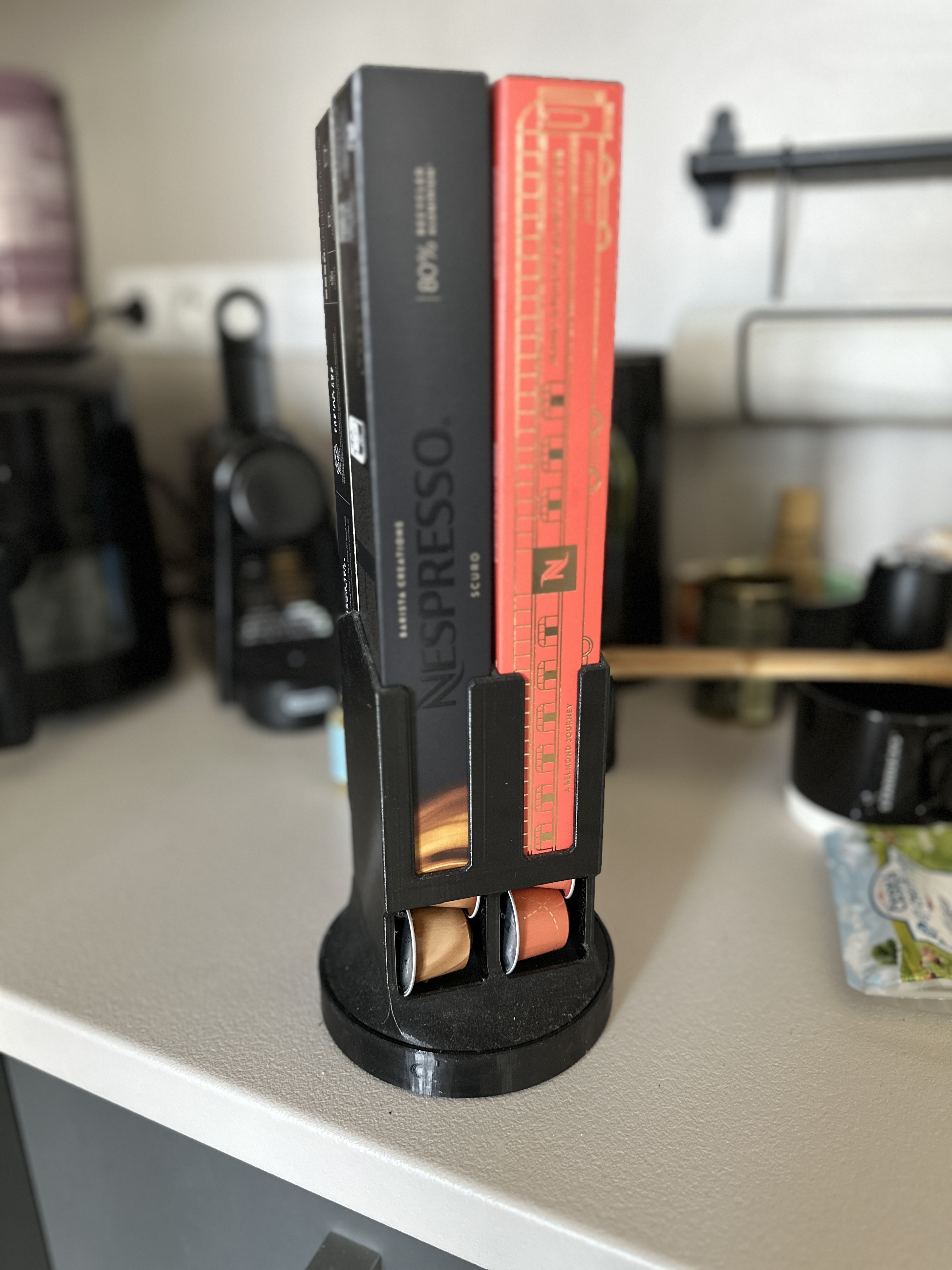 Nespresso capsule turning holder