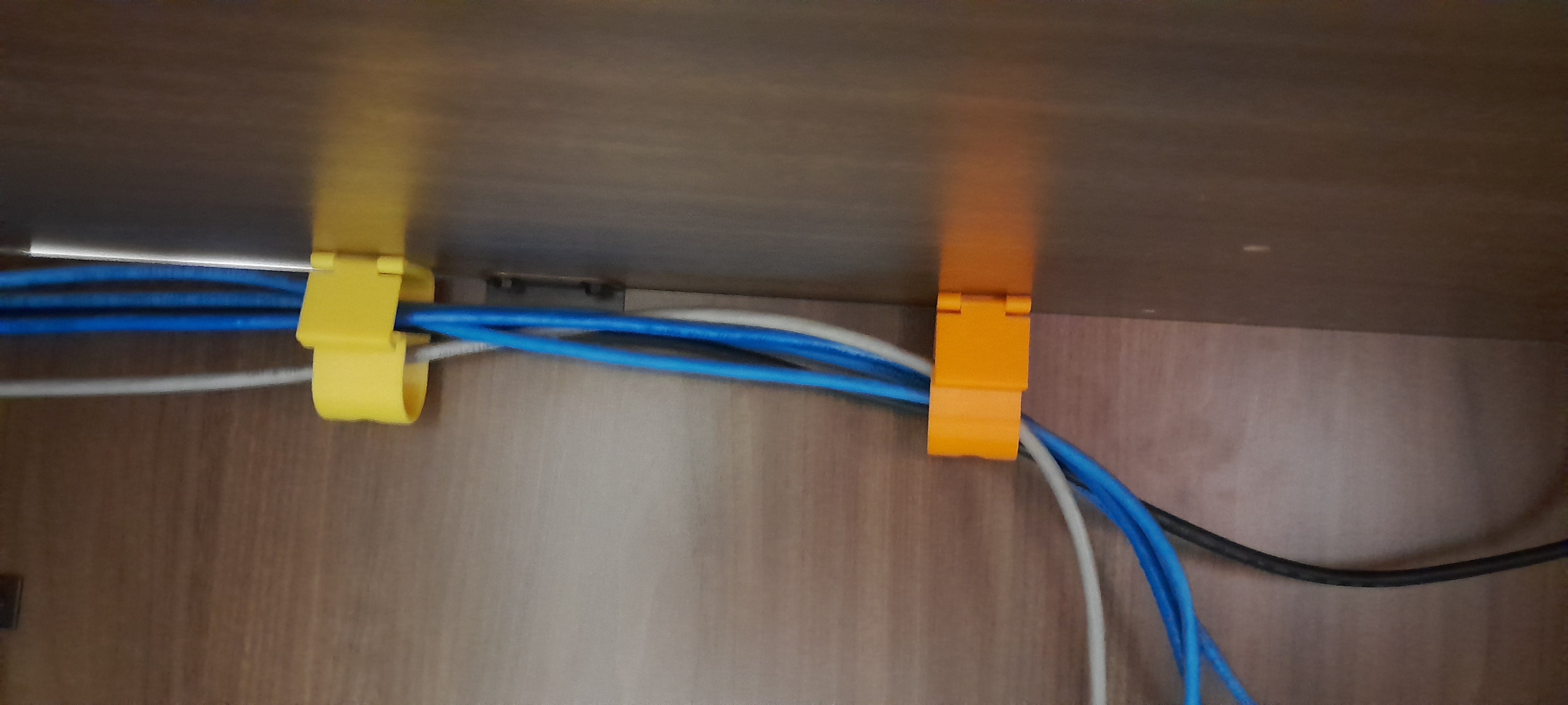 Desk cable holder