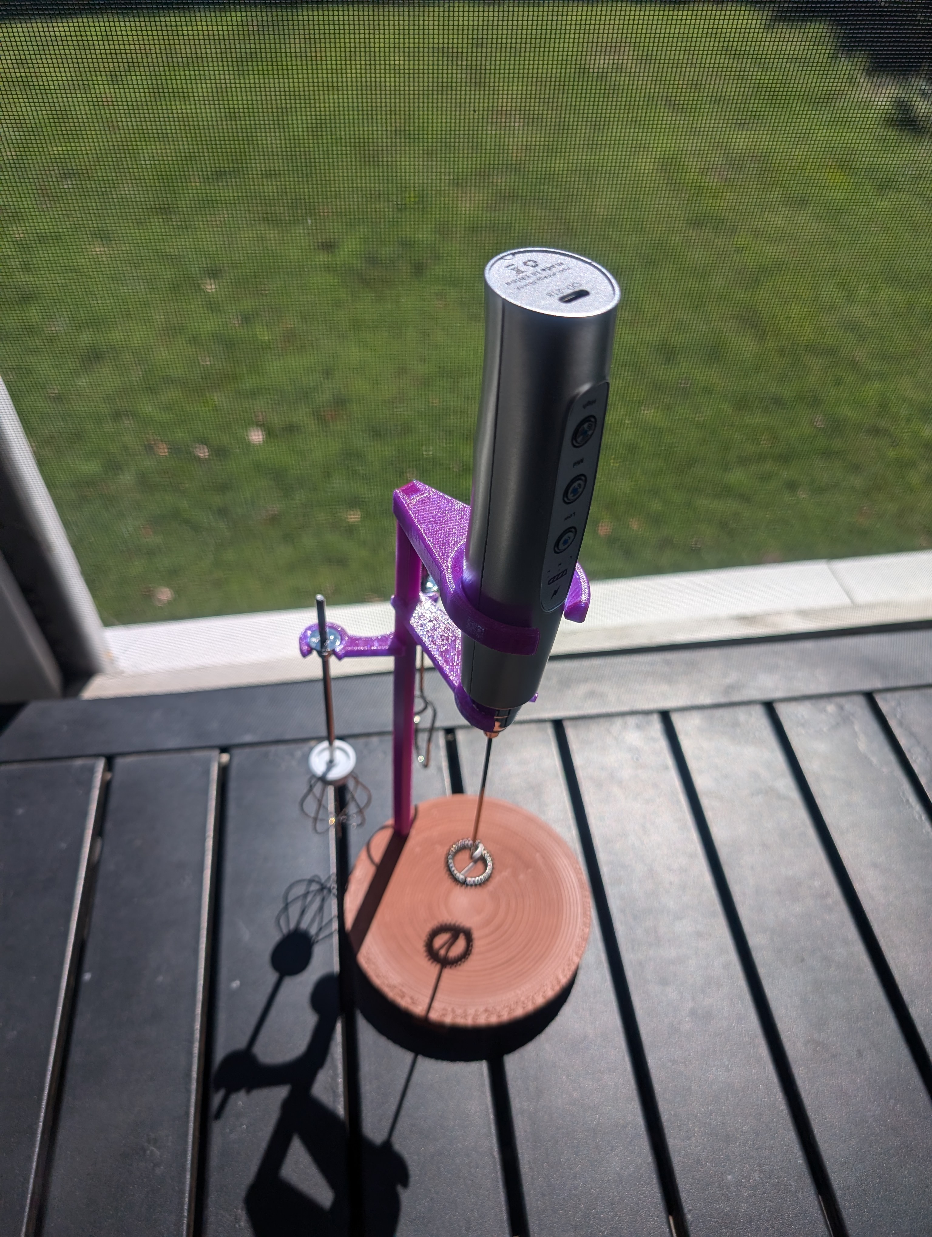 Milk Frother with attachments holder.