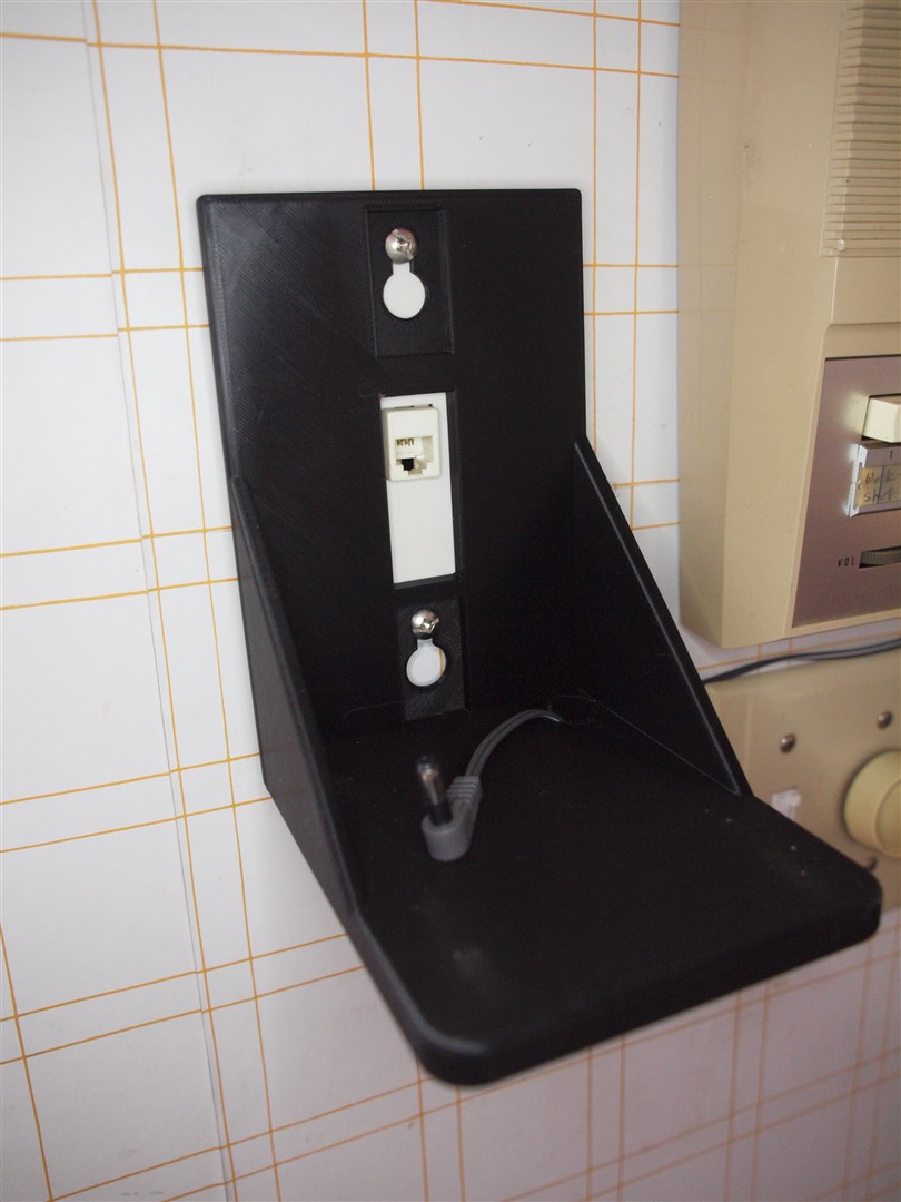 phone wall outlet shelf