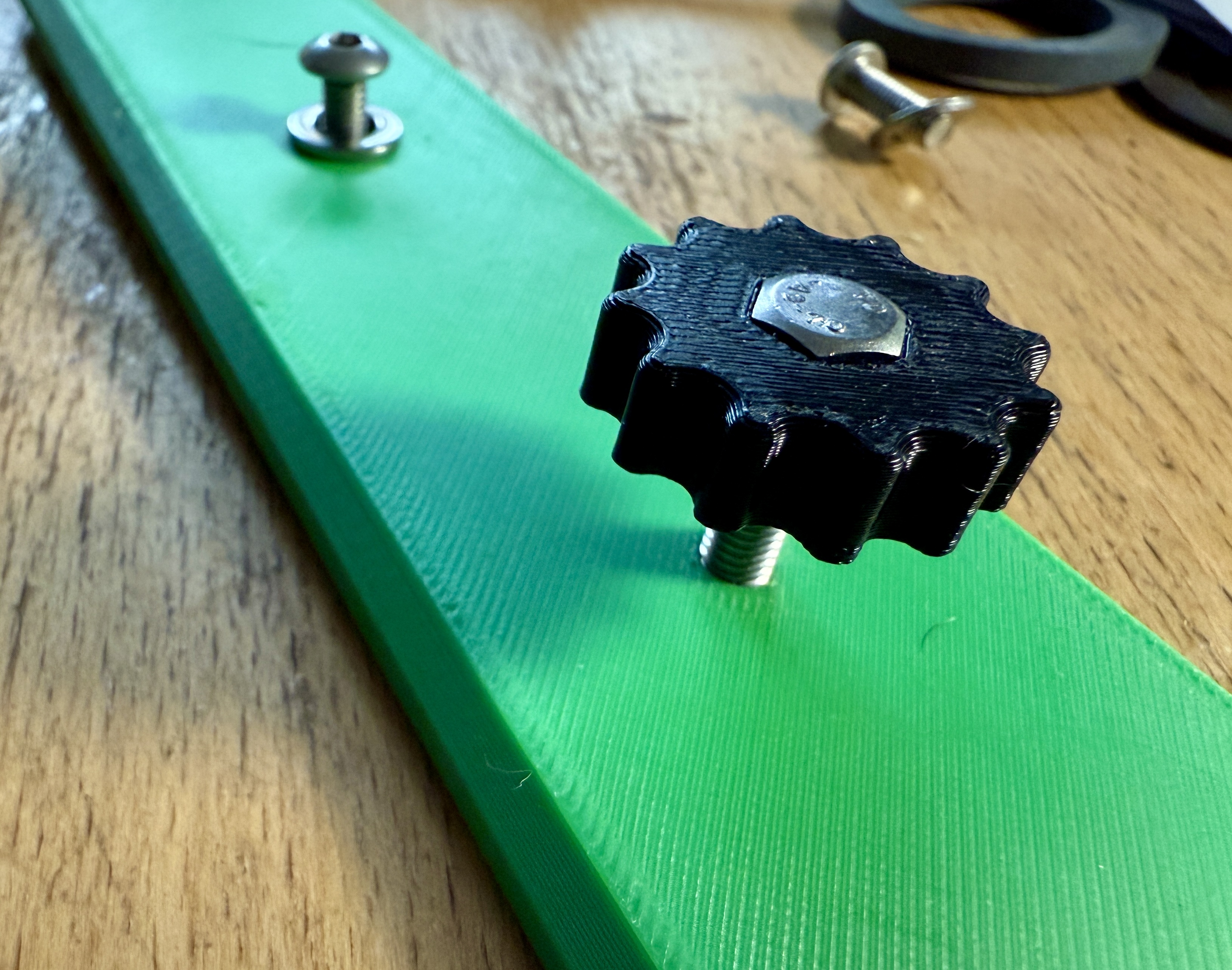 Bike bag thumbscrew