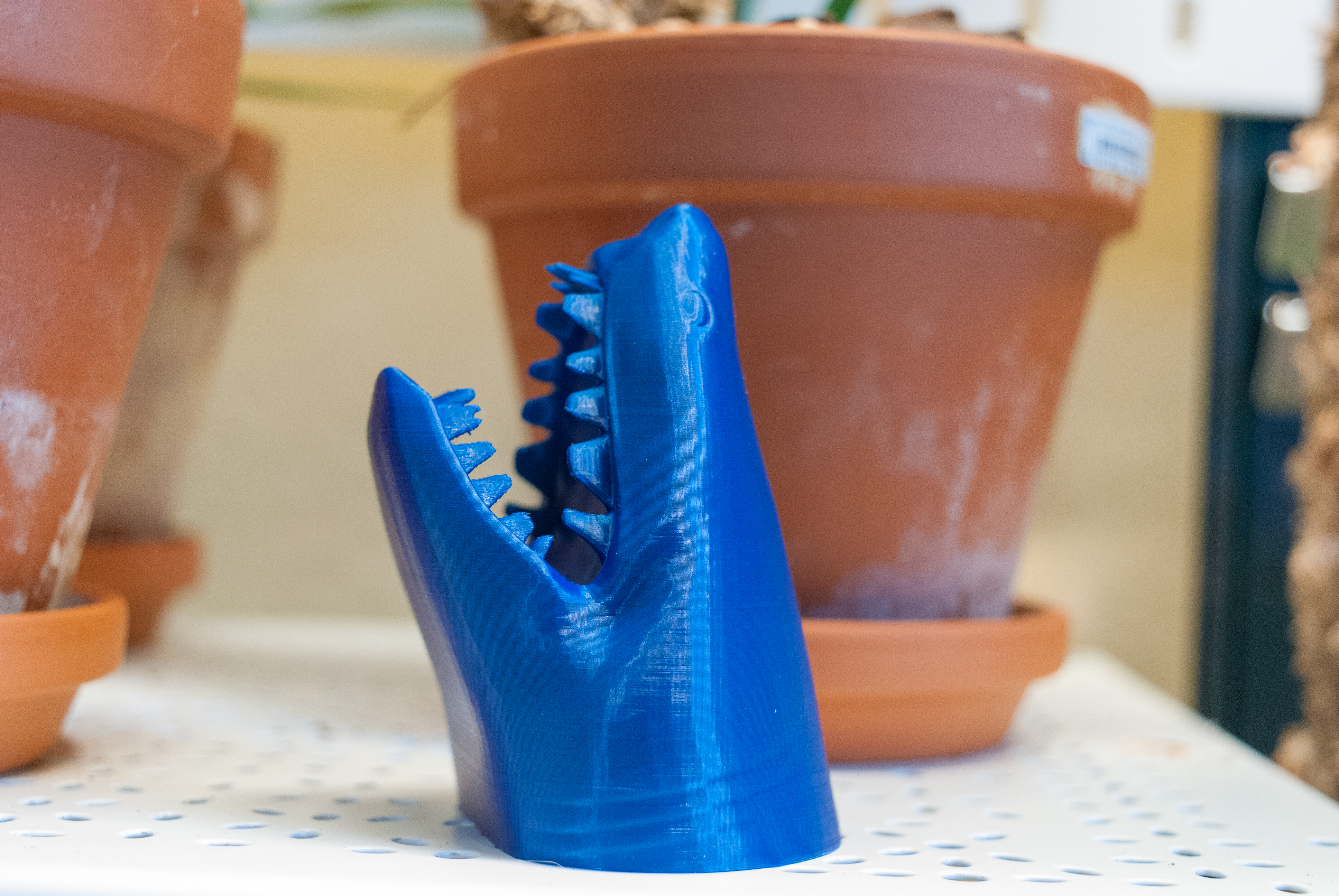 Shark! Desktop Cable Holder with weight compartment