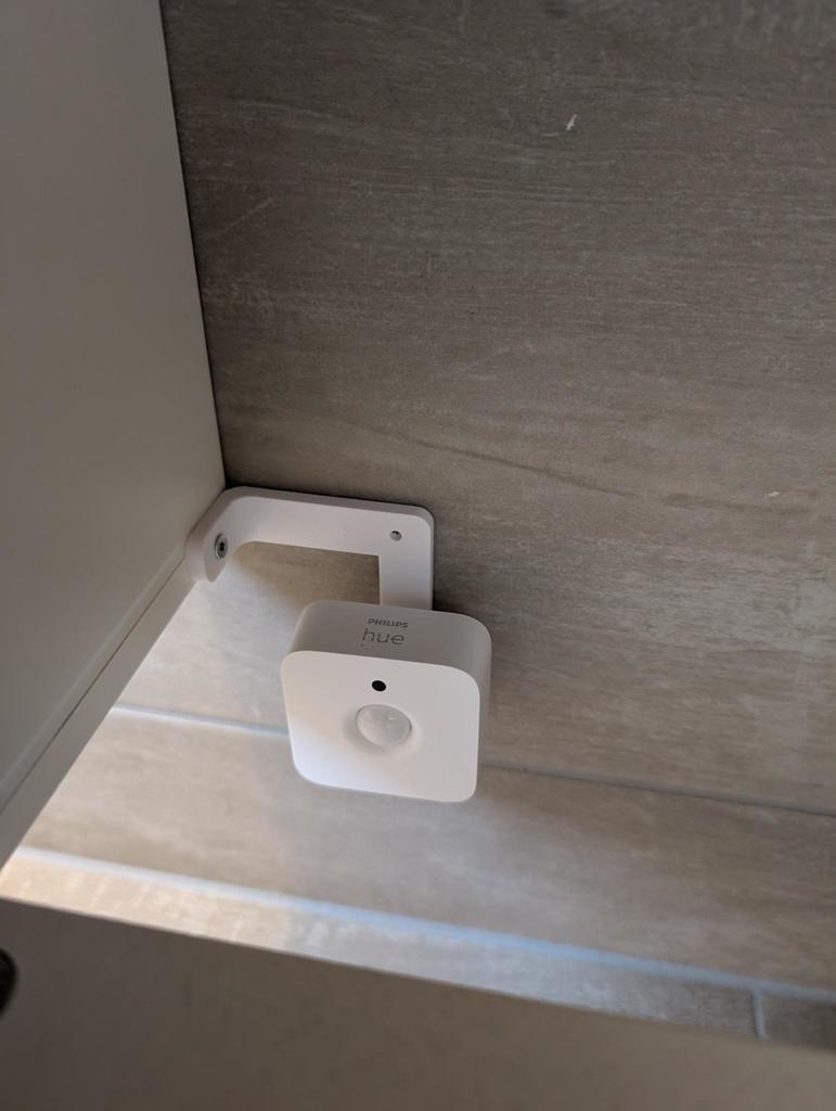 Philips Hue Motion Sensor Holder under washstand