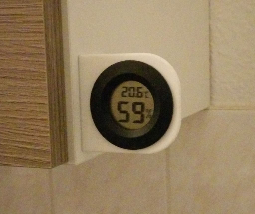Hygrometer holder (for gluing to a cupboard)