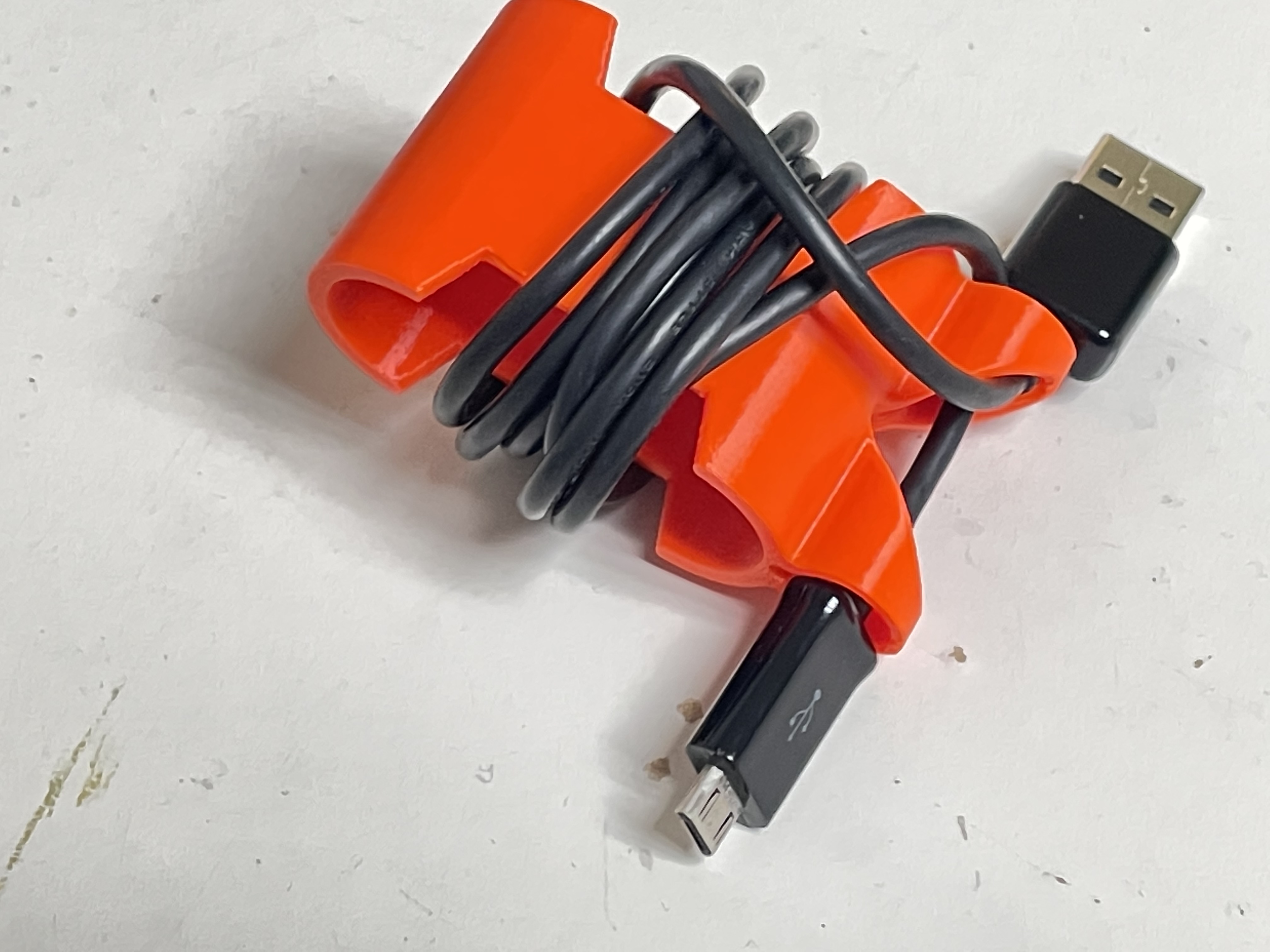 Squeezy to un-lock Cable Clip