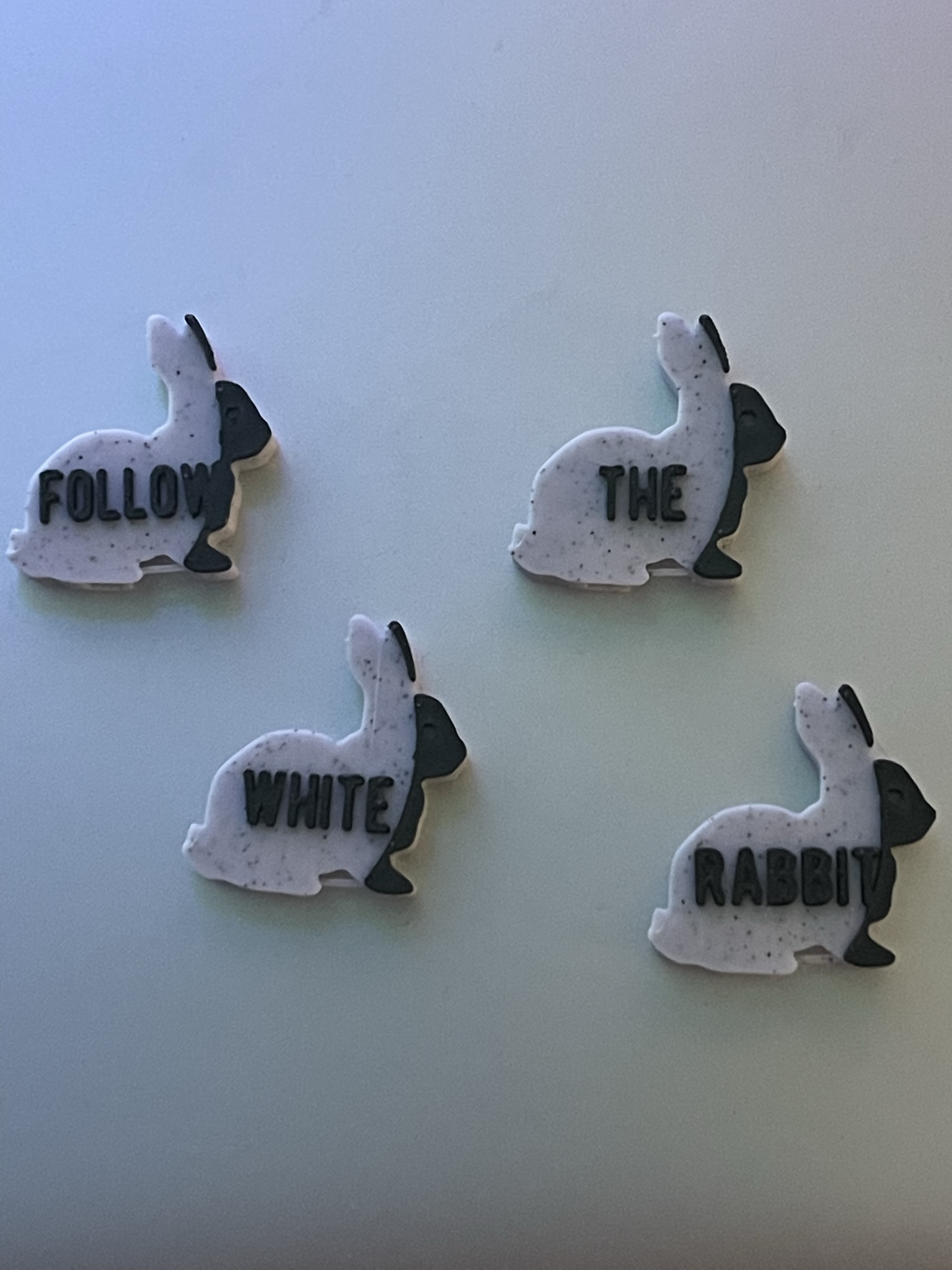Follow the White Rabbit saucy button caps